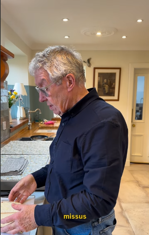Gregor Fisher standing in his kitchen | Source: Instagram/gregor.fisher.actor