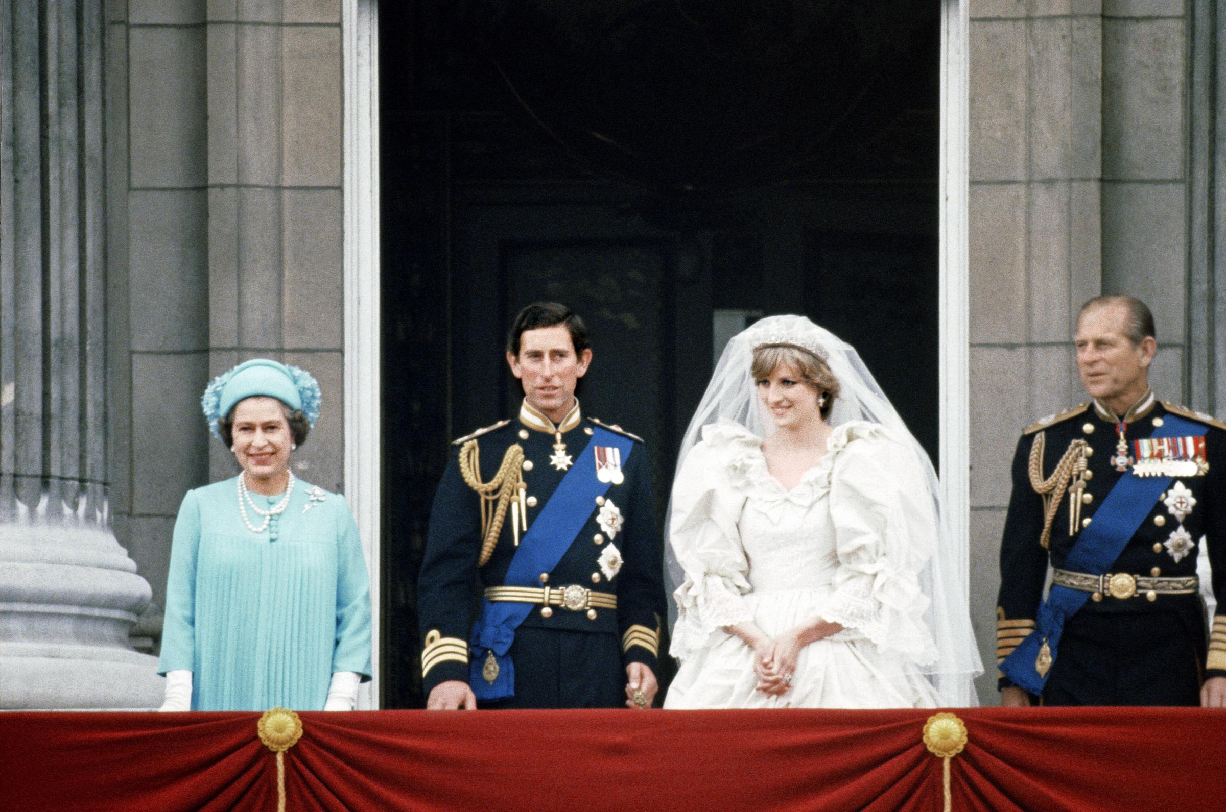 Queen Elizabeth II, Prince Charles, Lady Diana Spencer, and Prince Philip on the balcony at Buckingham Palace on July 29, 1981, in London, England. | Source: Getty Images