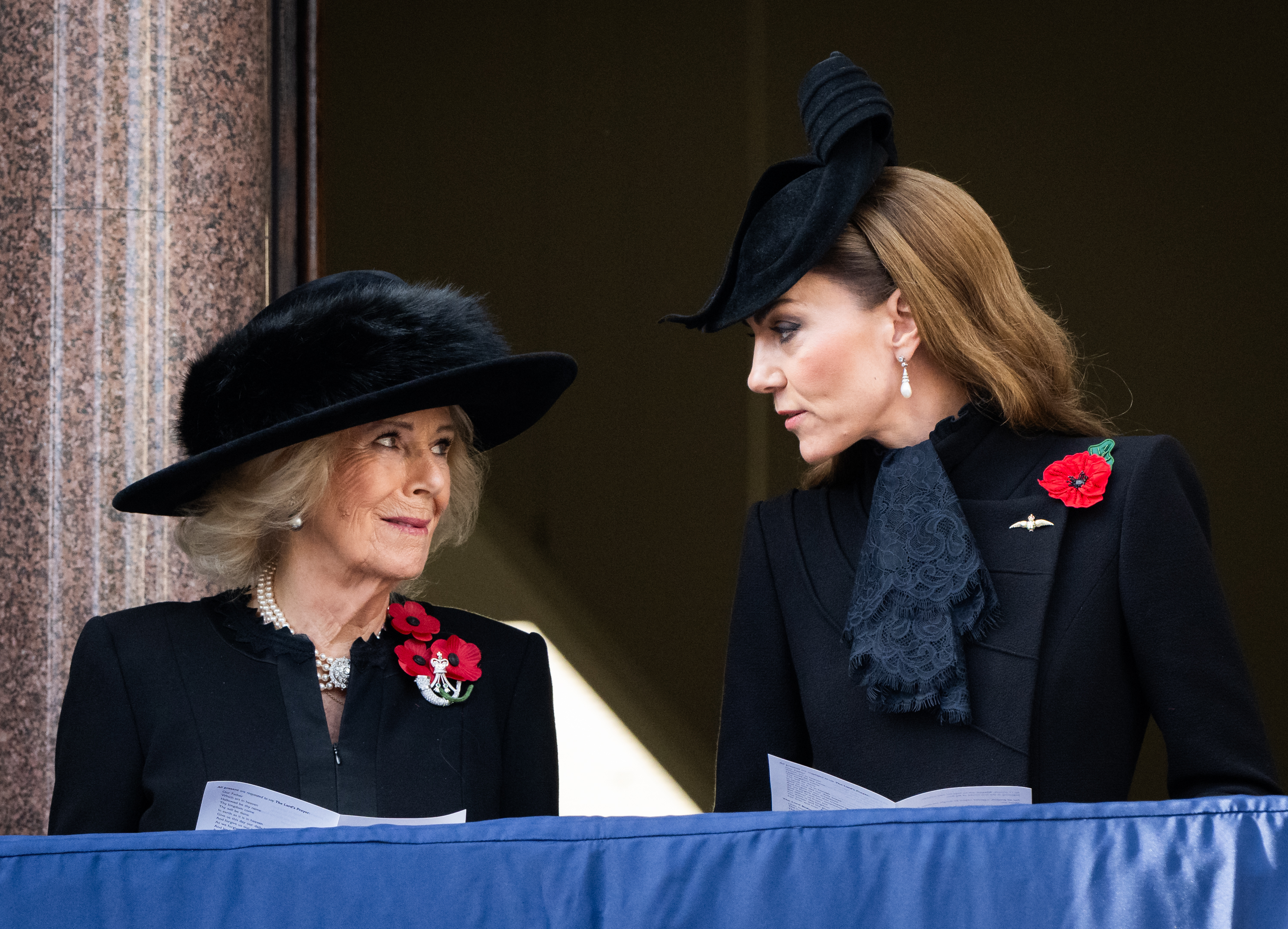 Queen Camilla and Catherine, Princess of Wales during the National Service of Remembrance at The Cenotaph on November 9, 2025 in London, England | Source: Getty Images