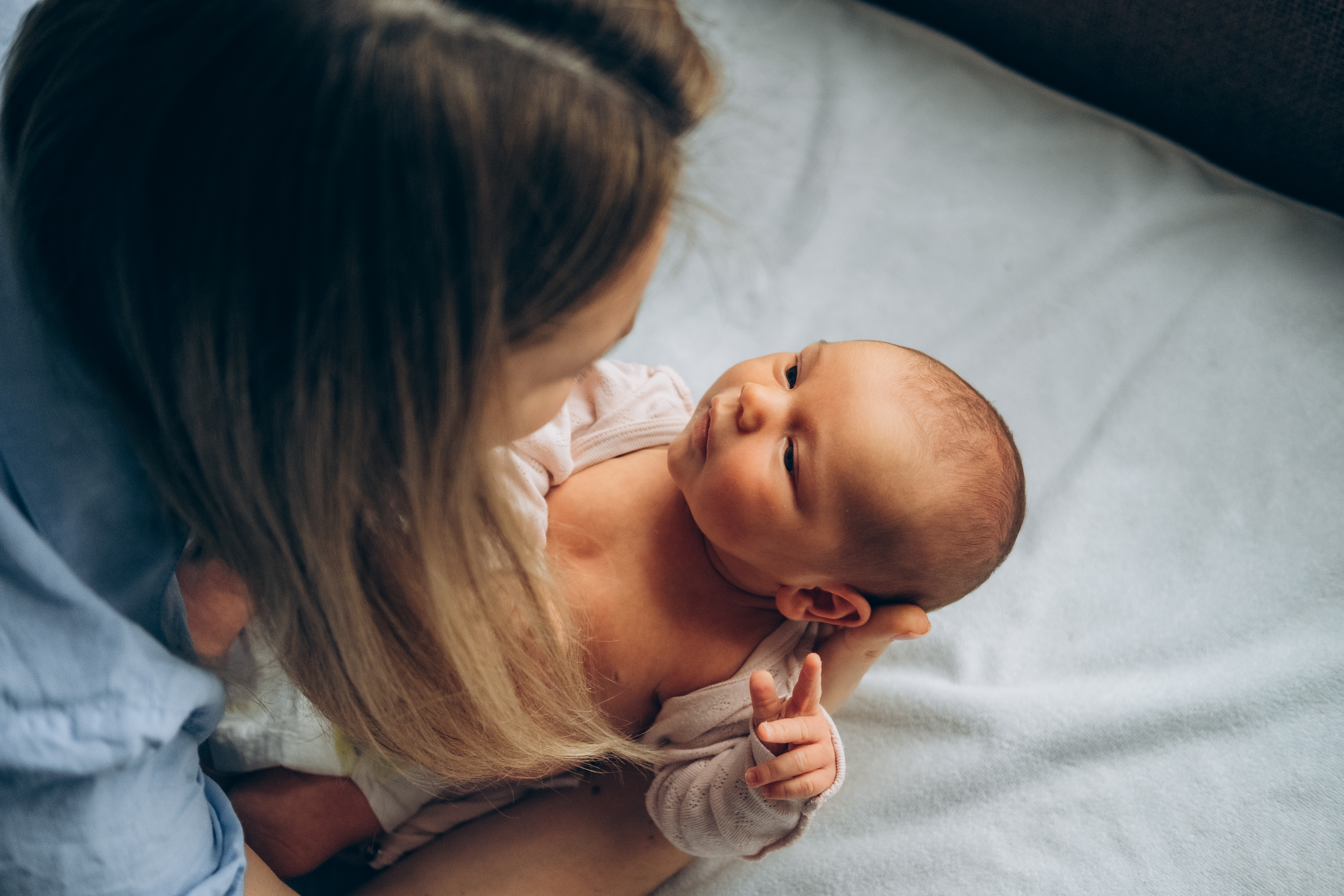 A mother with her newborn baby | Source: Shutterstock