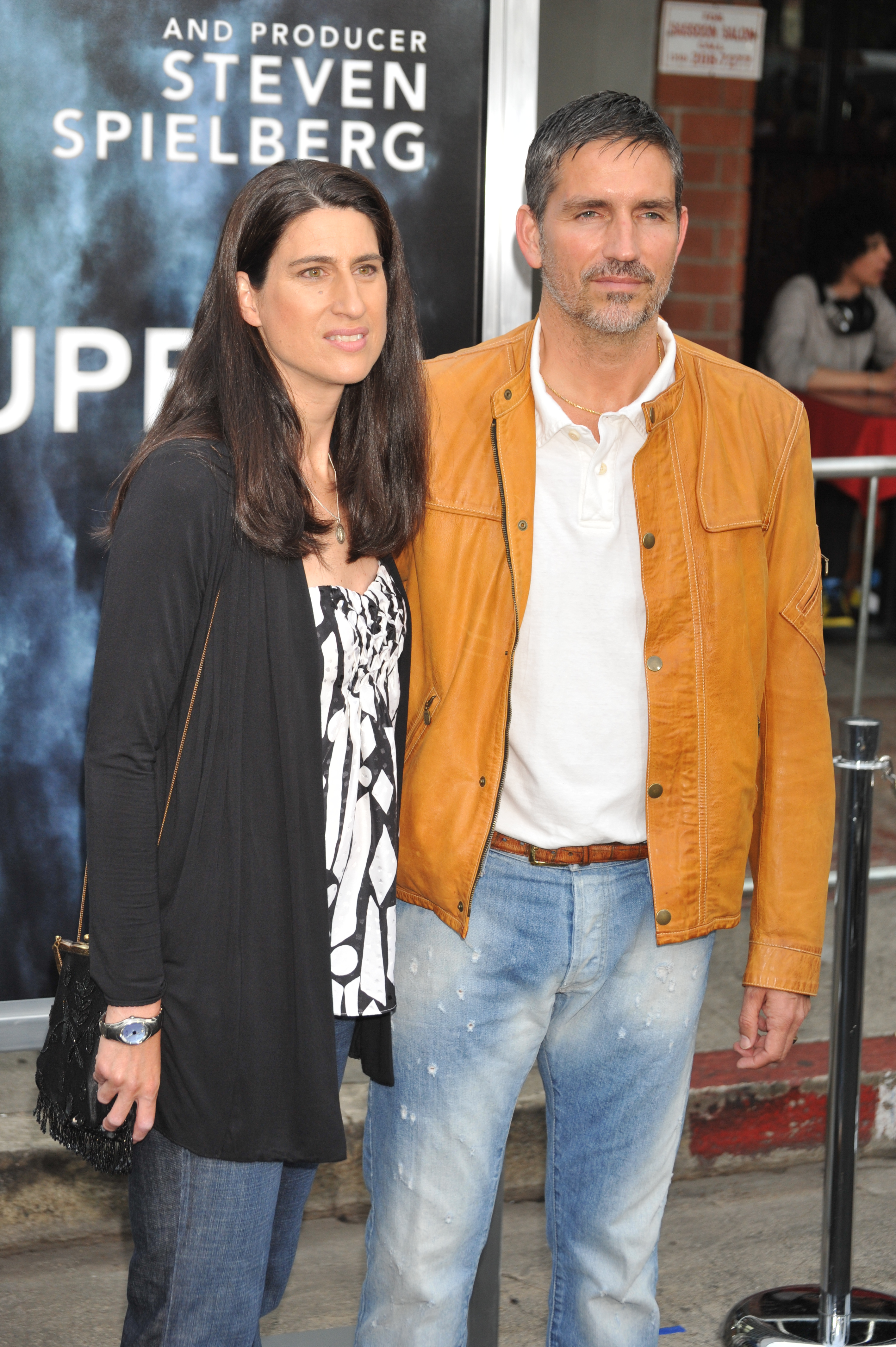 Jim Caviezal and his wife Kerri Browitt Caviezel arrive at the Premiere of Paramount Pictures' "Super 8" held at the Regency Village Theater in June 2011 in Westwood, California. | Source: Getty Images