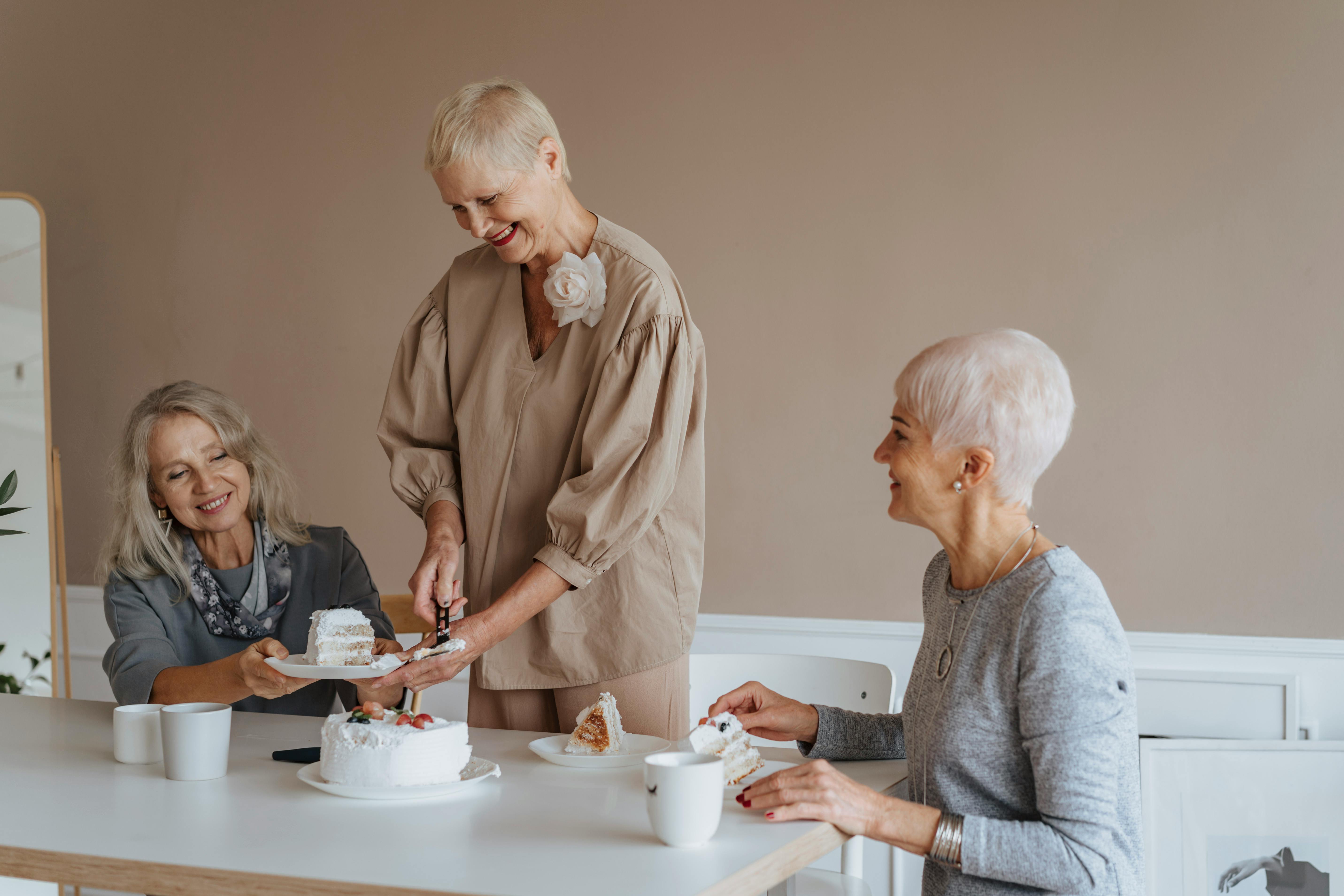 Older women enjoying cake and tea | Source: Pexels