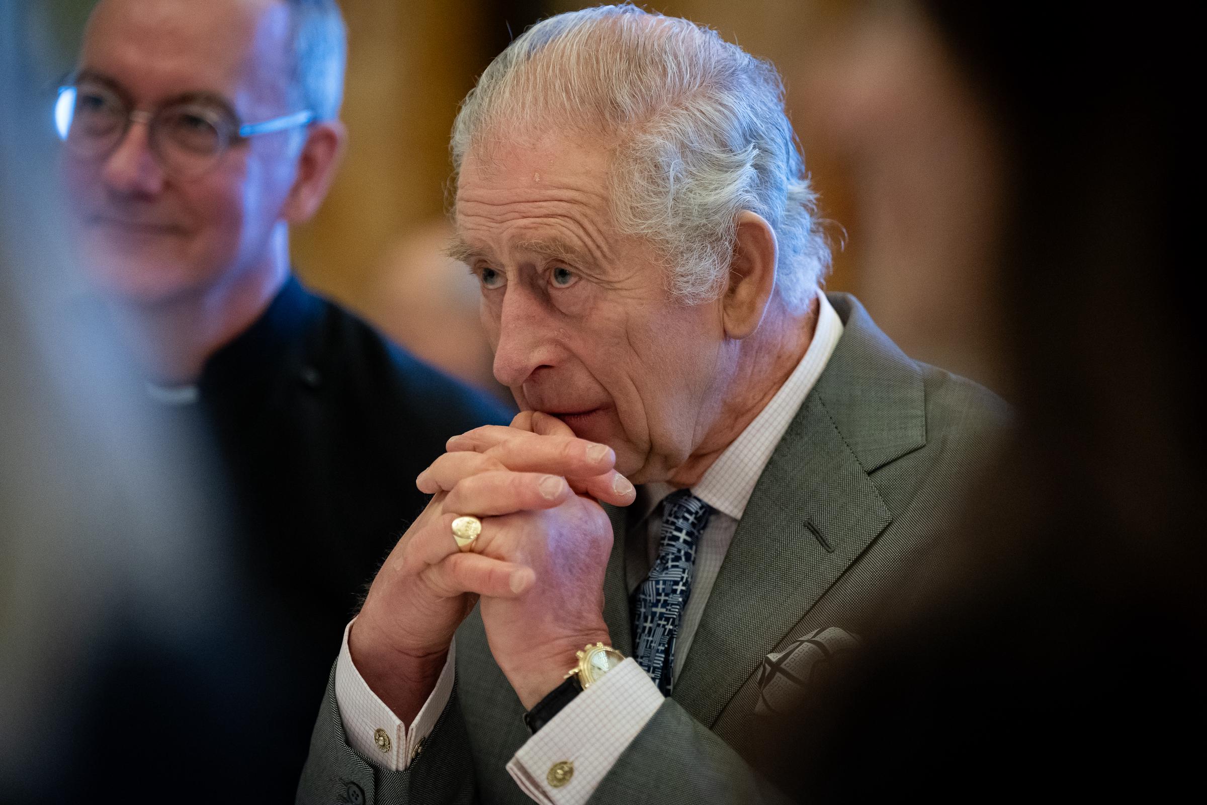 King Charles III hosts a gathering of a women-led UK community and faith leaders at Buckingham Palace in London on December 13, 2023. | Source: Getty Images