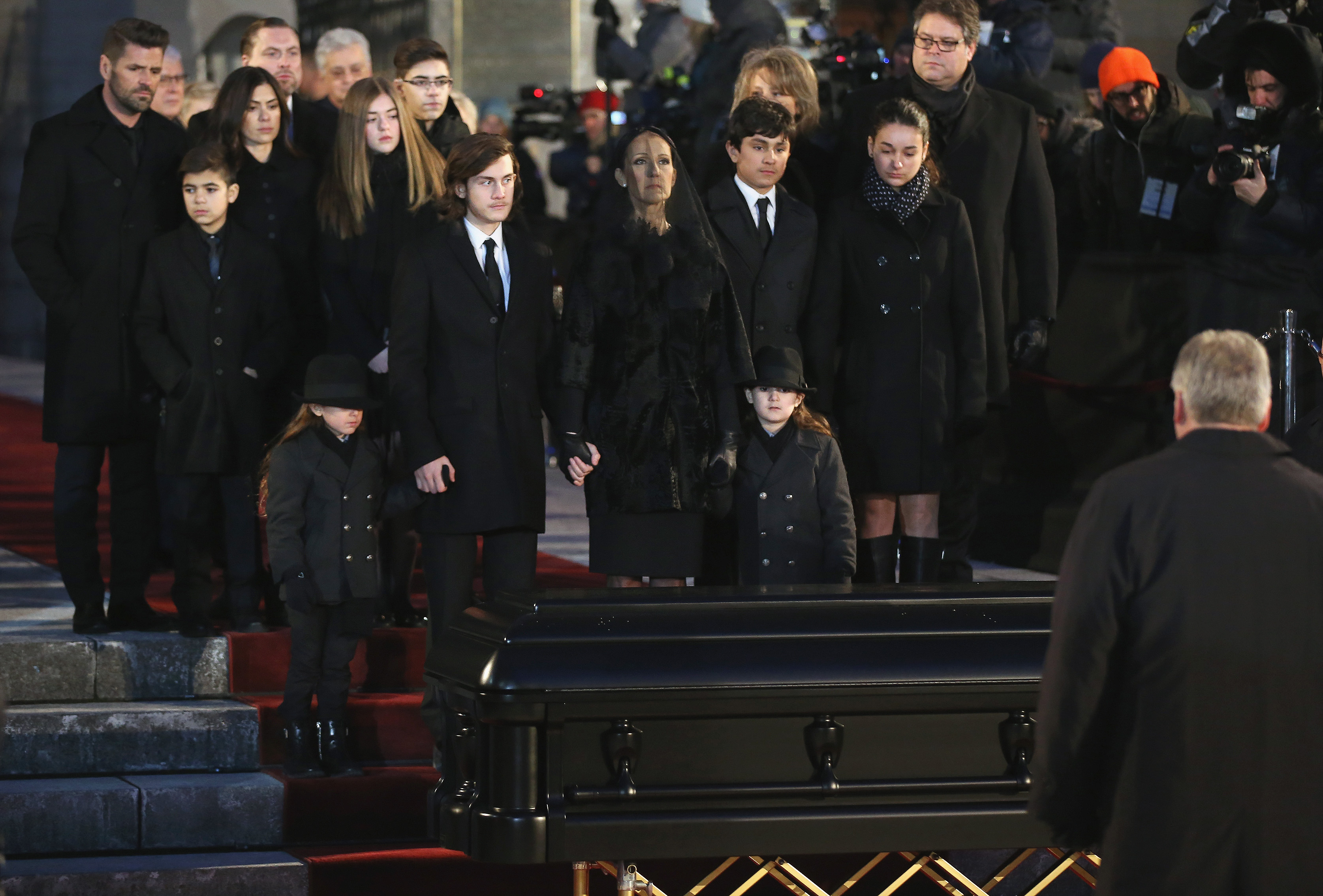Celine Dion and children Rene-Charles Angelil, Eddy Angelil and Nelson Angelil attend the State Funeral Service for Celine Dion's Husband Rene Angelil at Notre-Dame Basilica on January 22, 2016, in Montreal, Canada | Source: Getty Images