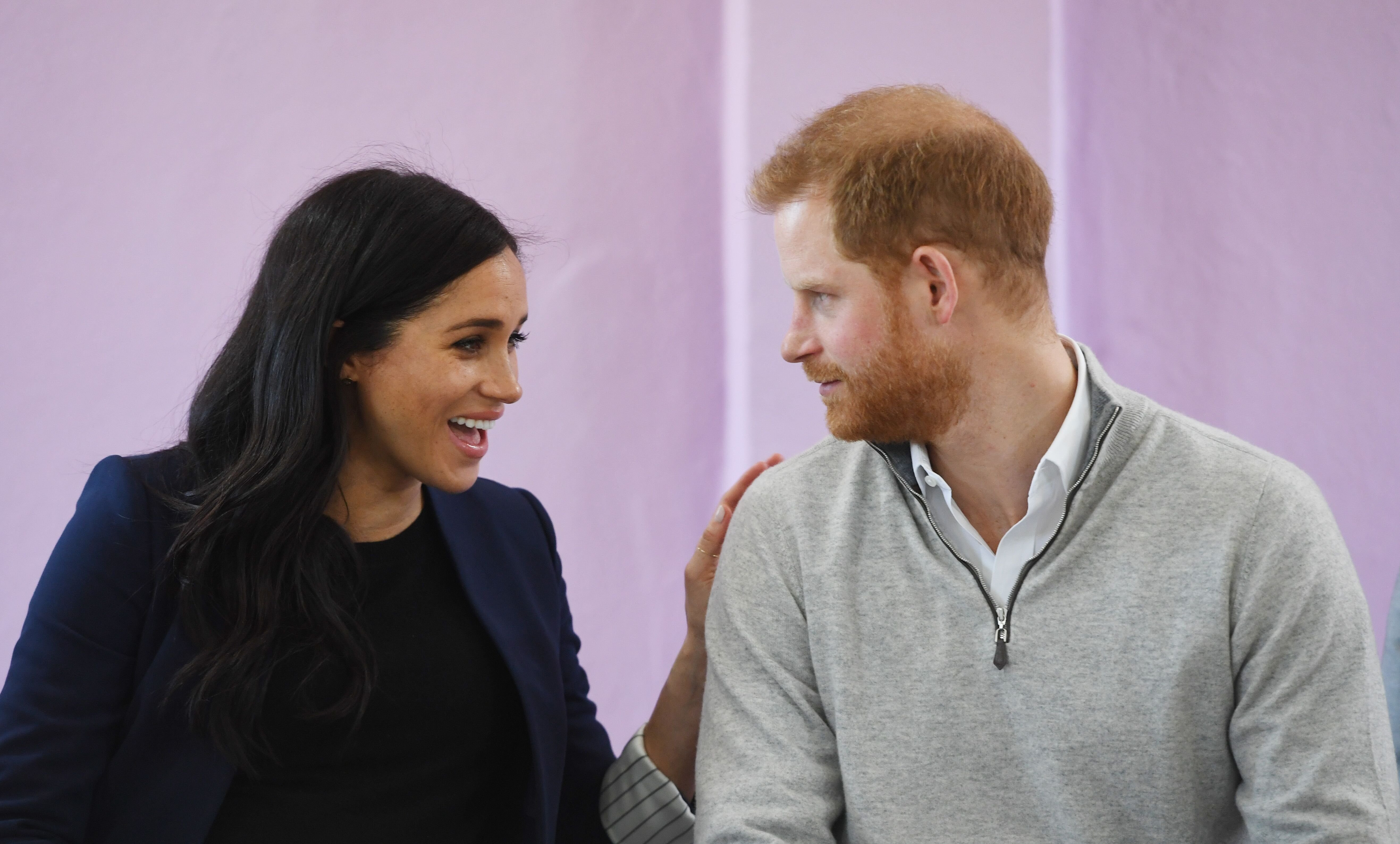 Meghan, Duchess of Sussex and Prince Harry, Duke of Sussex smile in a classroom during their visit to Lycée Qualifiant Grand Atlas, the local secondary school on February 24, 2019 | Photo: Getty Images