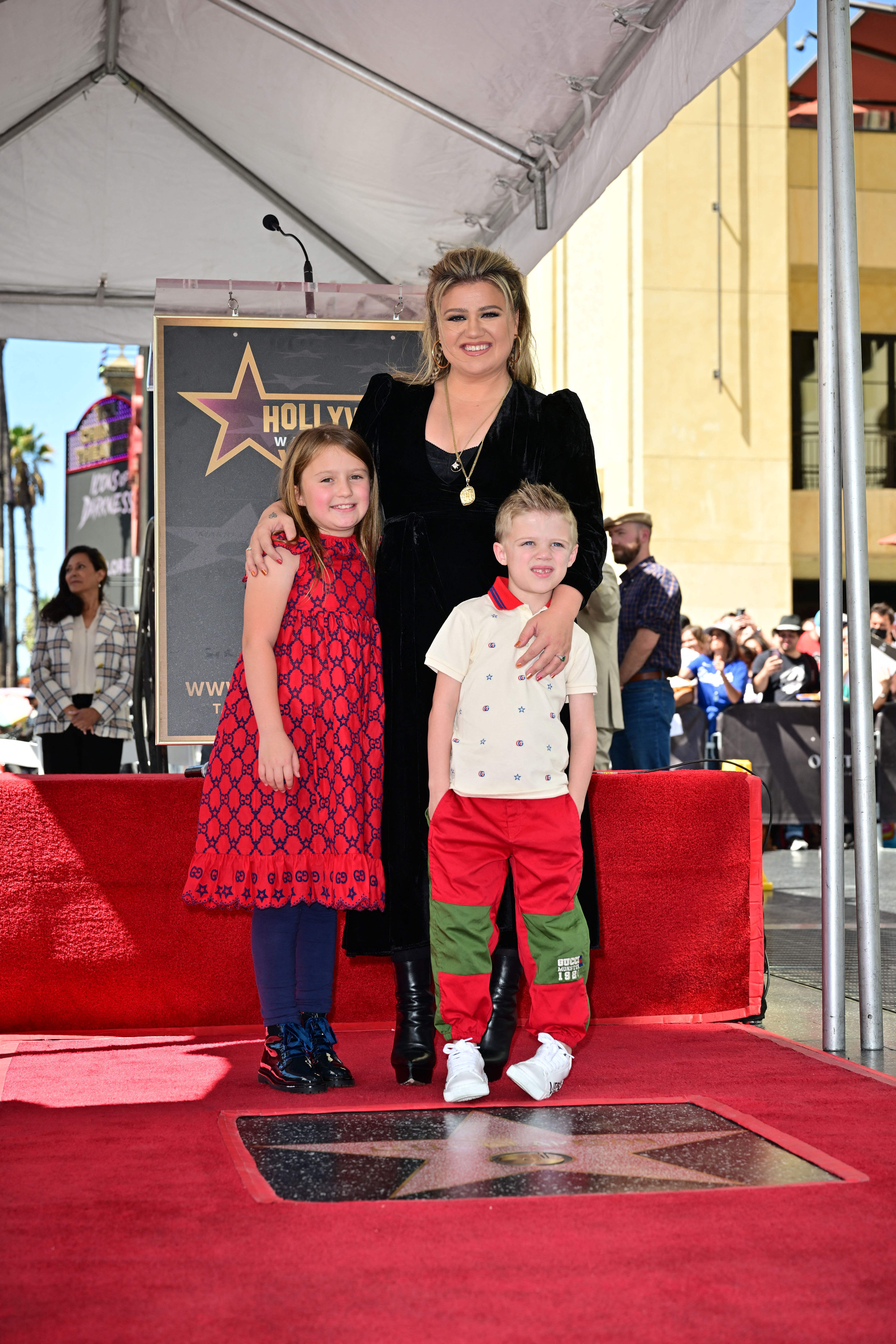 Kelly Clarkson with her kids, River Rose and Remington Blackstock, at her Hollywood Walk of Fame star ceremony in Hollywood, California on September 19, 2022 | Source: Getty Images
