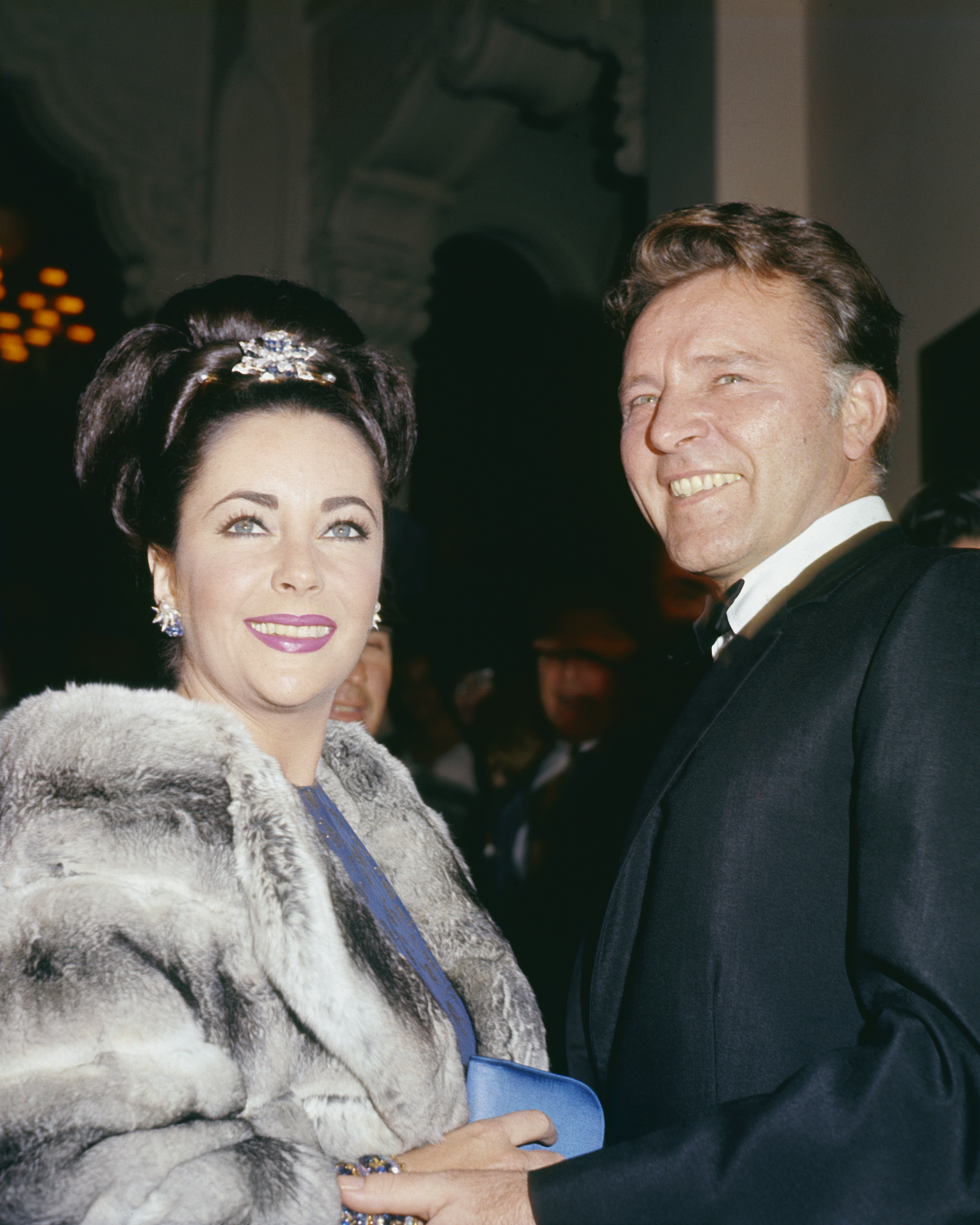 Elizabeth Taylor and Richard Burton attend the premiere of the latter's film, "The Spy Who Came in from the Cold" at the Warner Hollywood Theater in December 1965 in Hollywood, California. | Source: Getty Images