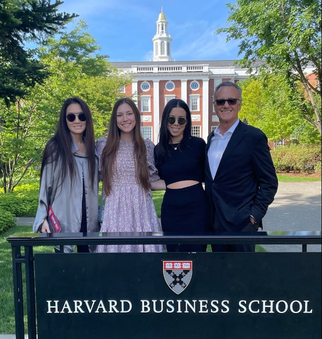 Despite the divorce, the family frequently gathered to celebrate significant academic and professional milestones together. At this event, they posed at the Harvard Business School sign on May 26, 2022, in Boston, Massachusetts. | Source: Instagram/verawang