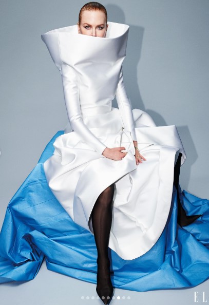Nicole Kidman wears a shaped white dress, and Balenciaga pantaleggings, $4,290, in Elle's 'Impact Issue' | Source: Instagram/eiffeltyler