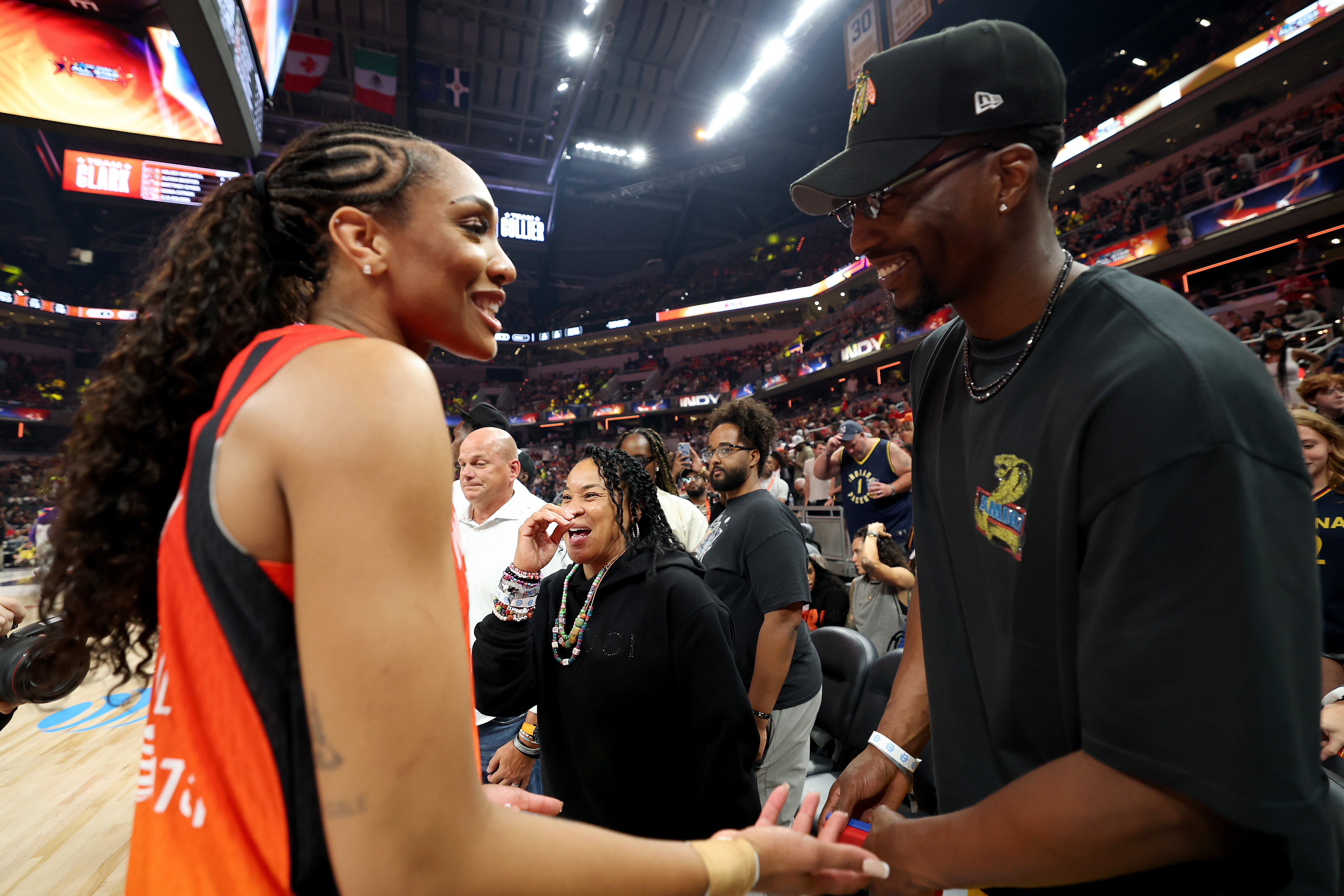 A'ja Wilson and Bam Adebayo talk during the AT&T WNBA All-Star Game at Gainbridge Fieldhouse on July 19, 2025, in Indianapolis, Indiana | Source: Getty Images
