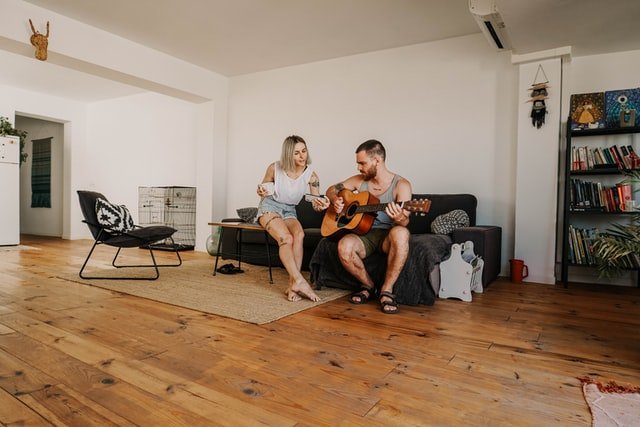 Couple sitting in  Airbnb in Mallorca | Source: Unsplash