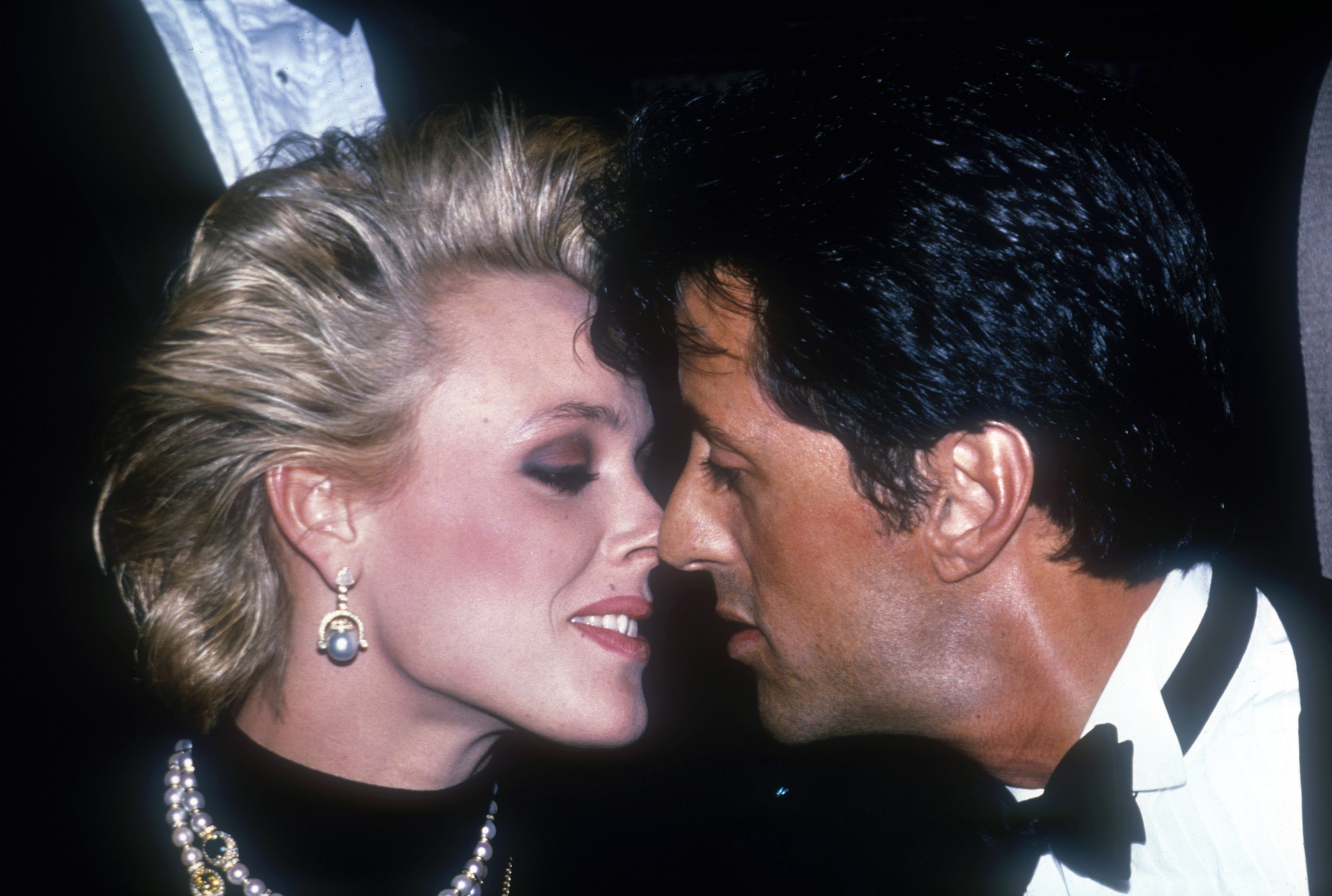 American actor Sylvester Stallone and Brigitte Nielsen attend a ceremony where he was presented with the 'Man of the Year' award by the Hasty Pudding Theatricals group at Harvard University on February 18, 1986 in Cambridge, Massachusetts | Photo: Getty Images