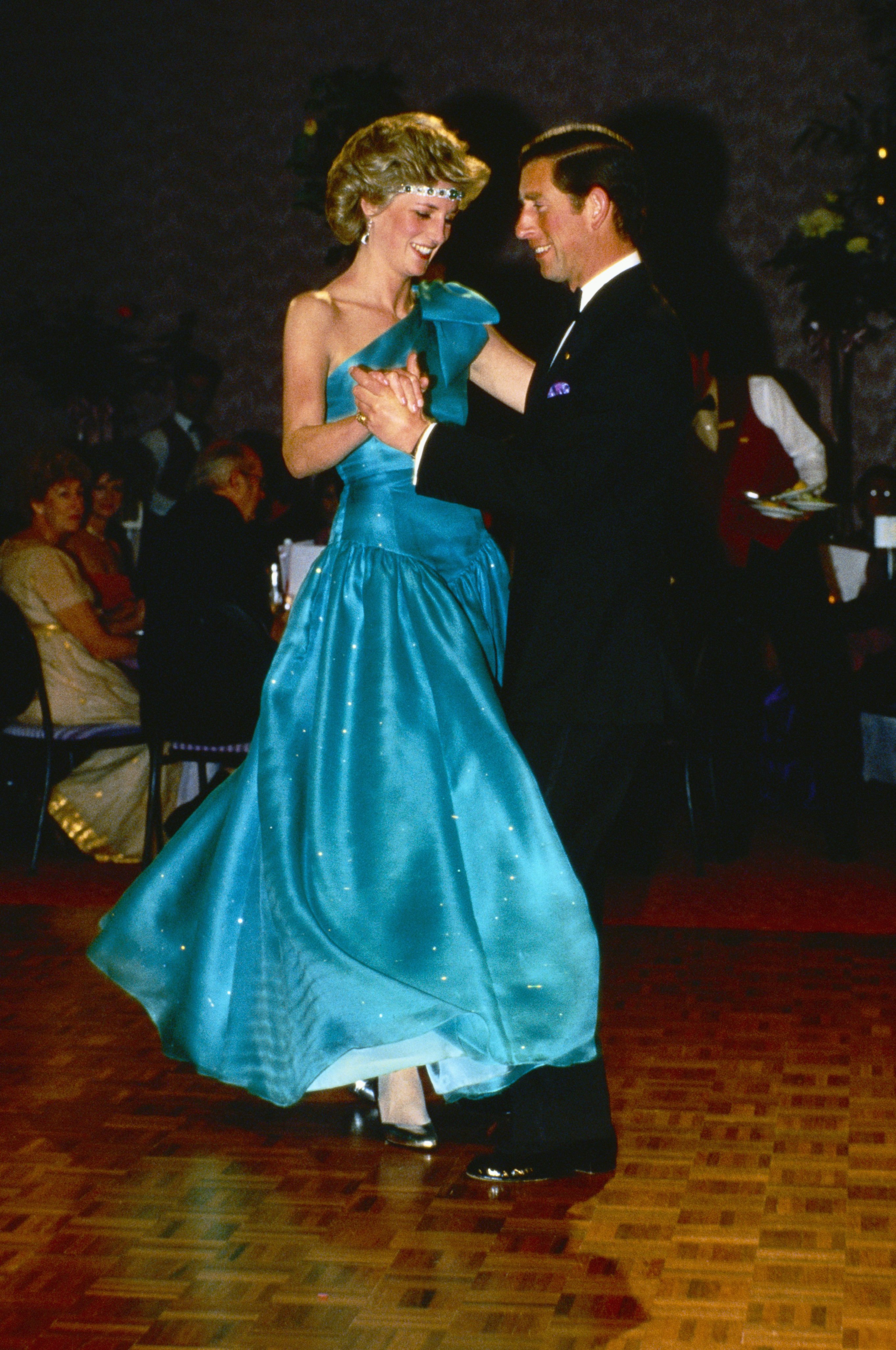 Princess Diana and Prince Charles dance at a formal event. | Source: Getty Images