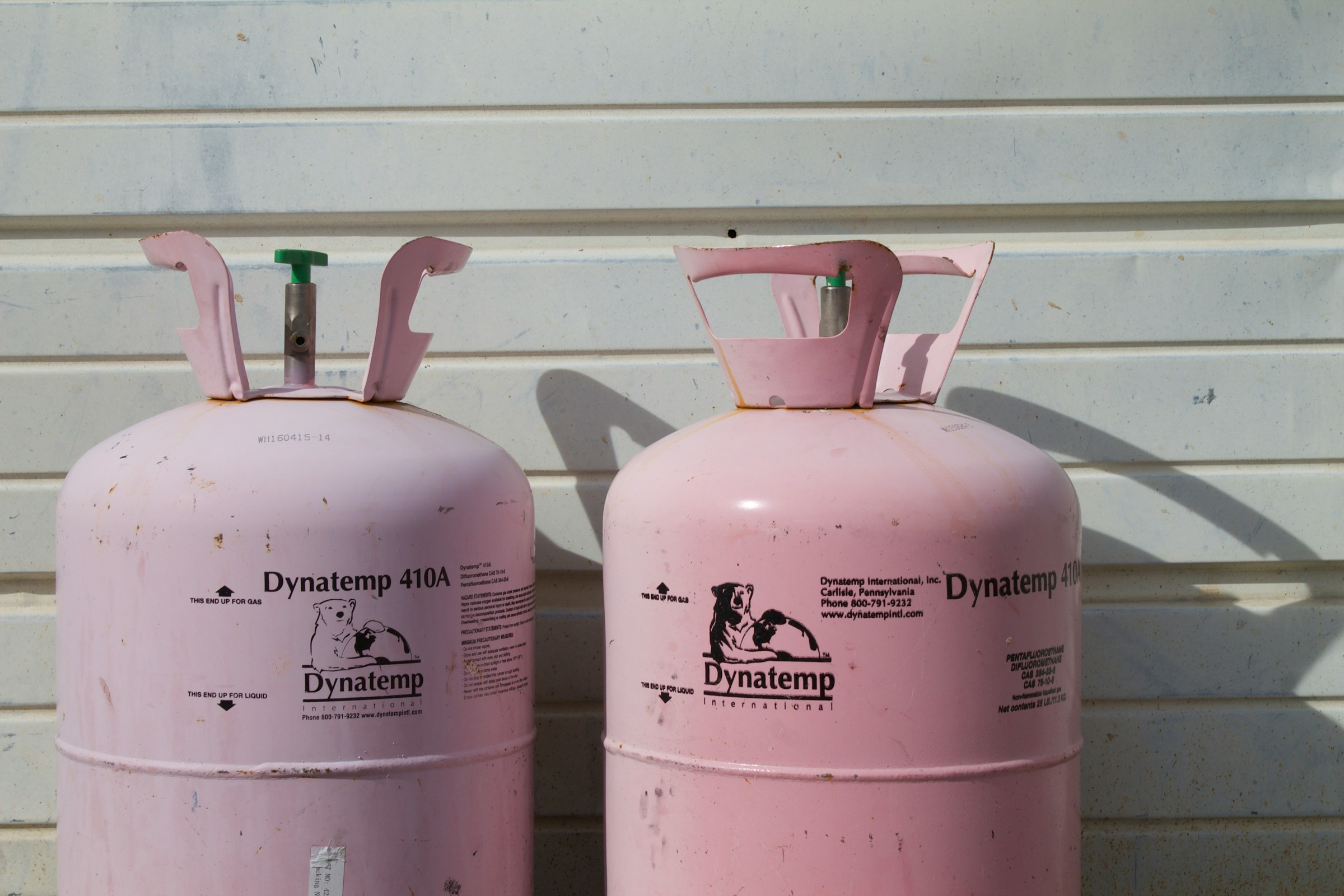 Two pink gas bottles | Source: Unsplash