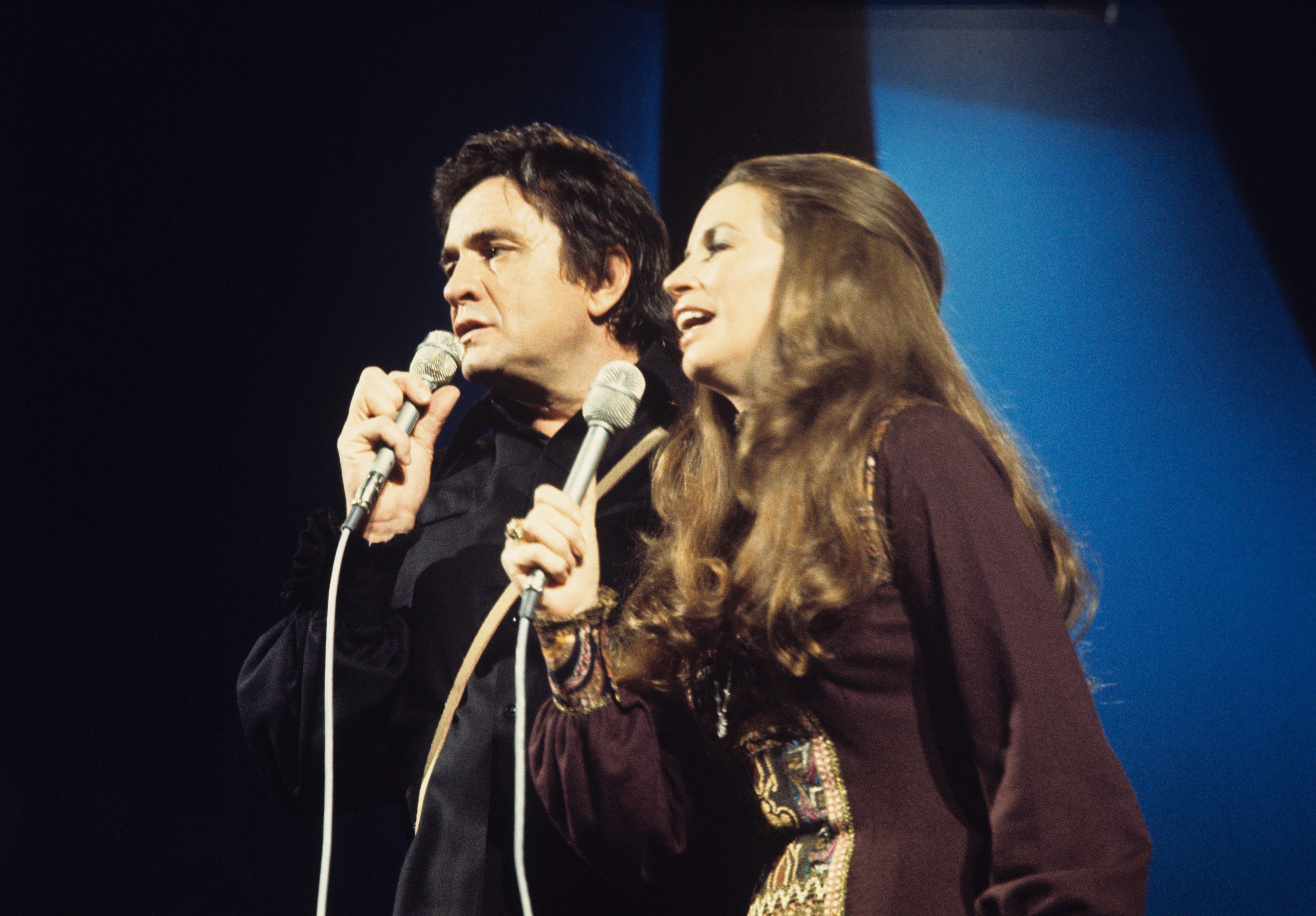 Johnny Cash and June Carter perform on stage at Concertgebouw in Amsterdam, Netherlands, in 1972 | Source: Getty Images