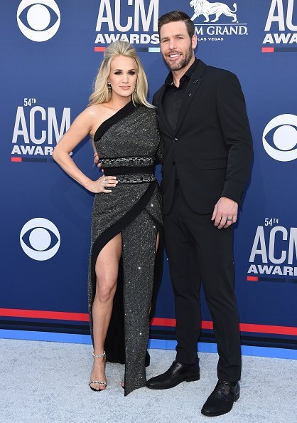Carrie Underwood and Mike Fisher at the 54th Academy of Country Music Awards on April 07, 2019 | Photo: Getty Images