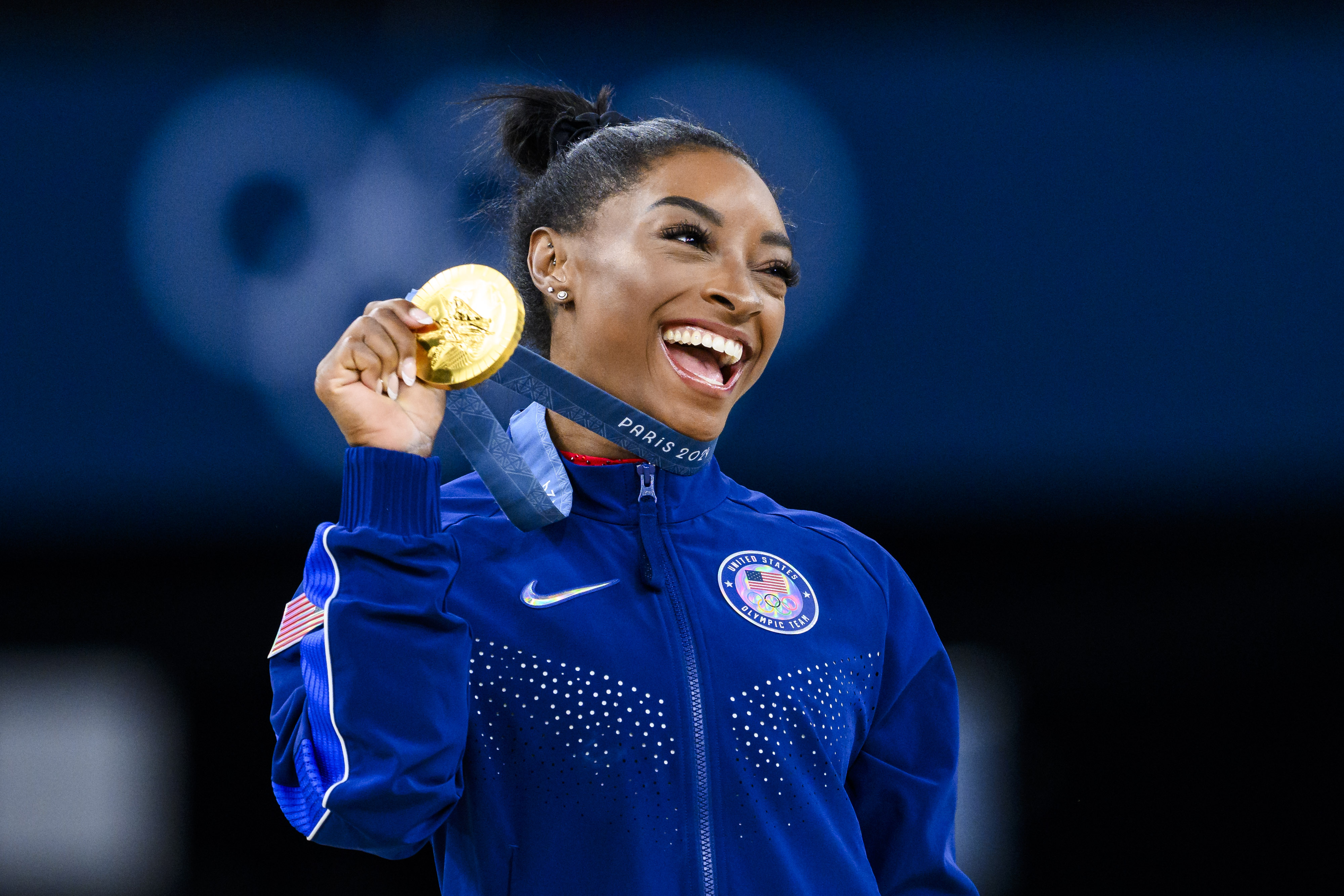 Nothing in this moment hinted that the conversation would soon move beyond gymnastics. The celebration that followed gave the public an entirely different glimpse into Biles' Olympic journey. | Source: Getty Images