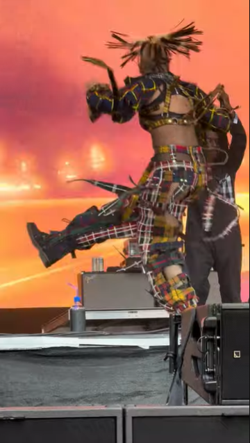 Gwen Stefani performs in a tattered tartan outfit at the Minnesota Yacht Club Music Festival on July 19, 2024. | Source: YouTube/norahgxve