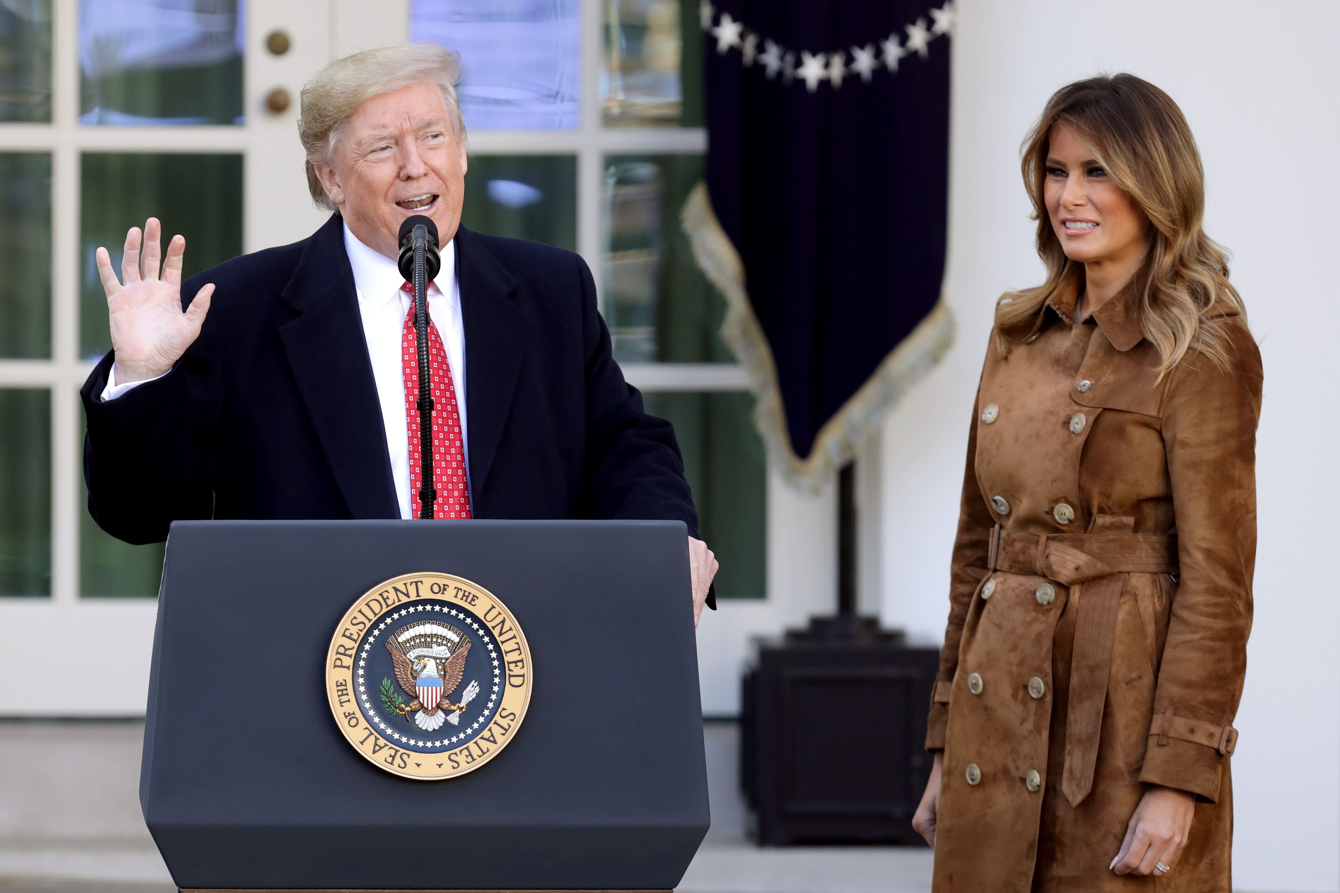  U.S. President Donald Trump delivers remarks before giving a presidential ‘pardon’ to the National Thanksgiving Turkey 'Butter' during the traditional event with first lady Melania Trump (R) in the Rose Garden of the White House November 26, 2019 in Washington, DC | Photo: Getty Images
