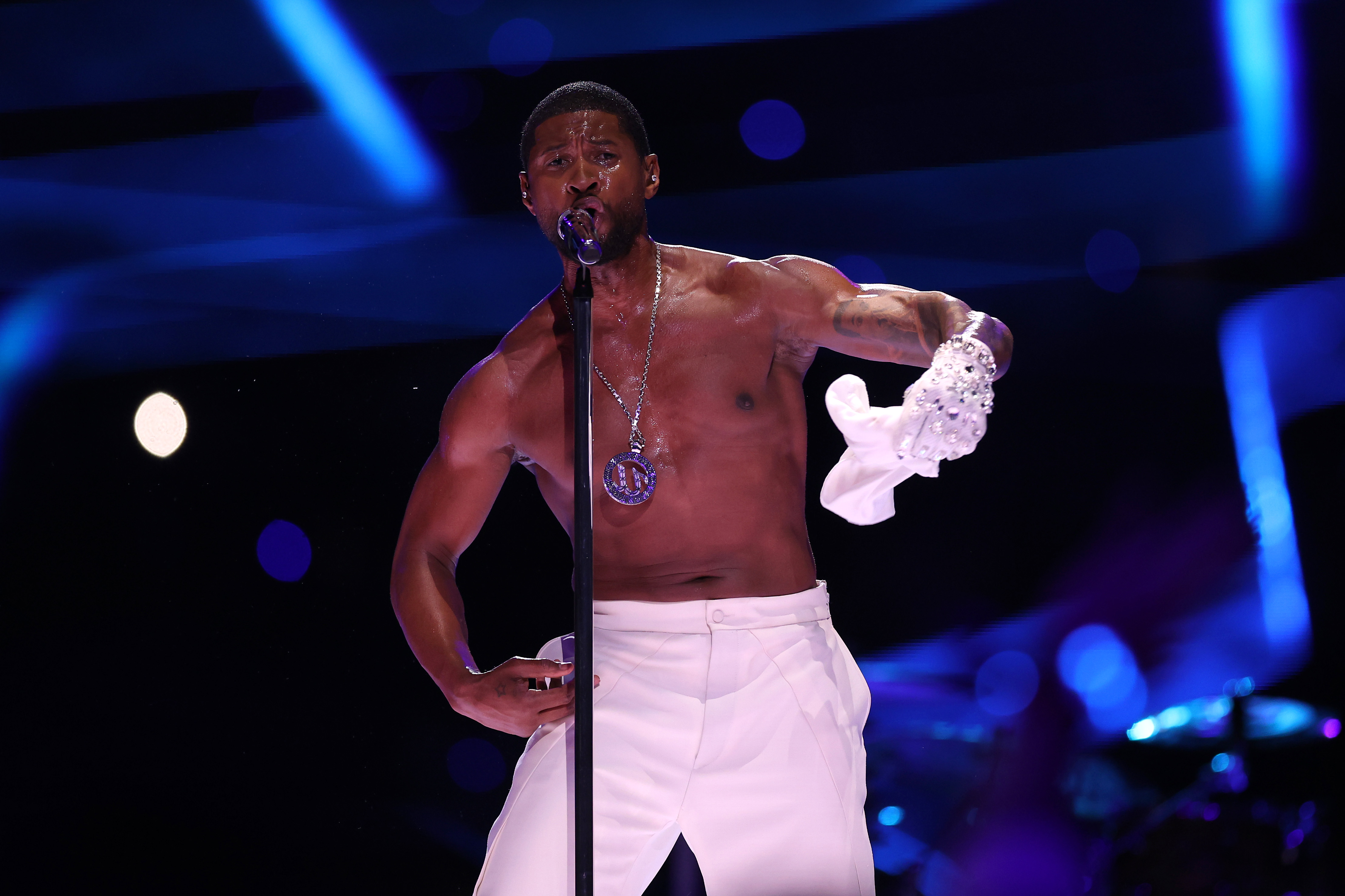Usher performs during the Apple Music Super Bowl LVIII Halftime Show on February 11, 2024 in Las Vegas, Nevada | Source: Getty Images