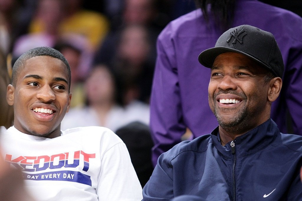 Denzel Washington and son Malcolm Washington during the Los Angeles Lakers vs. Miami Heat game at the Staples Center on January 11, 2009, in Los Angeles, California | Source: Getty Images