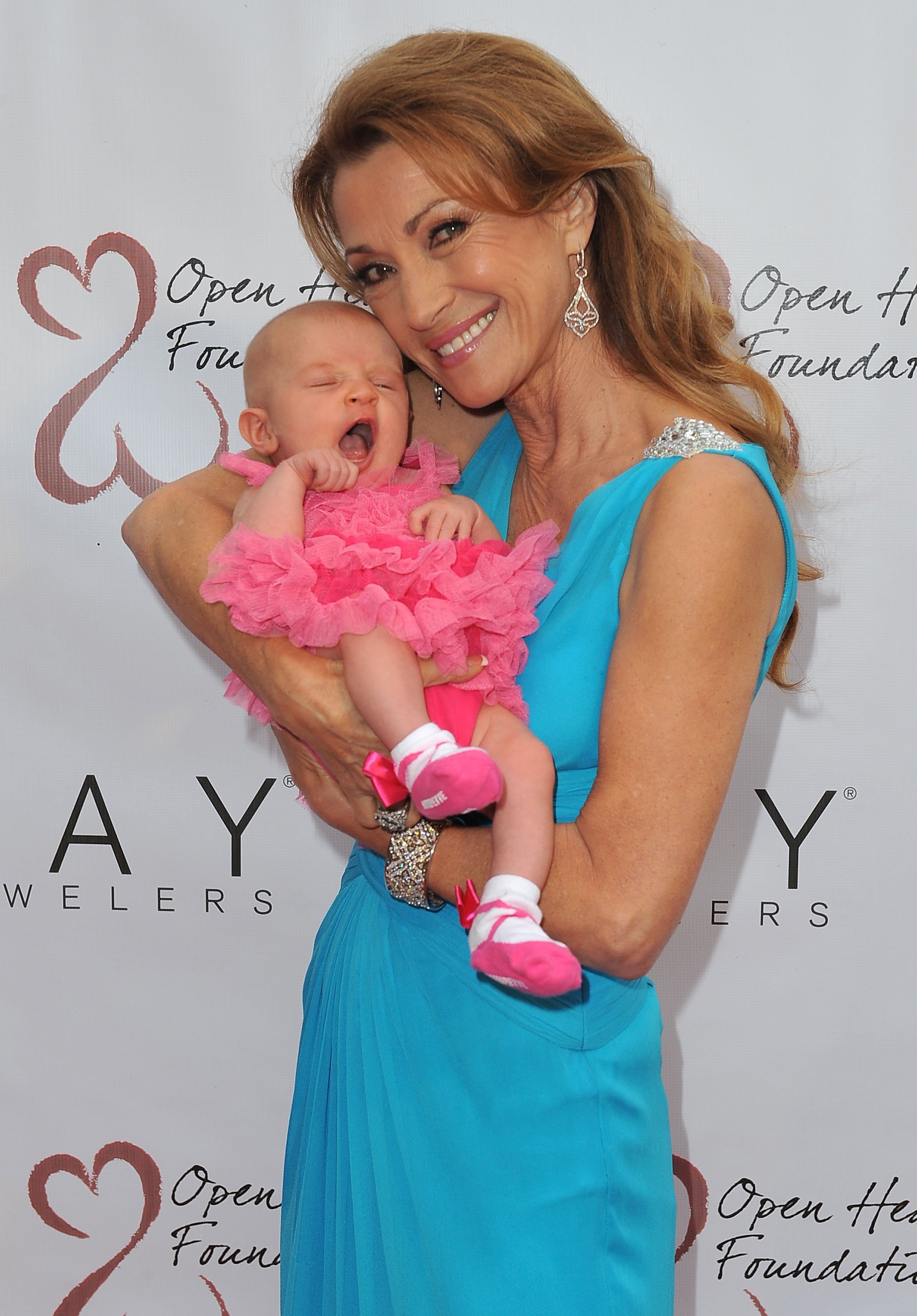 Jane Seymour with her granddaughter attends her 3rd annual Open Hearts Foundation celebration at a private residence on April 13, 2013 in Malibu, California | Source: Getty Images 