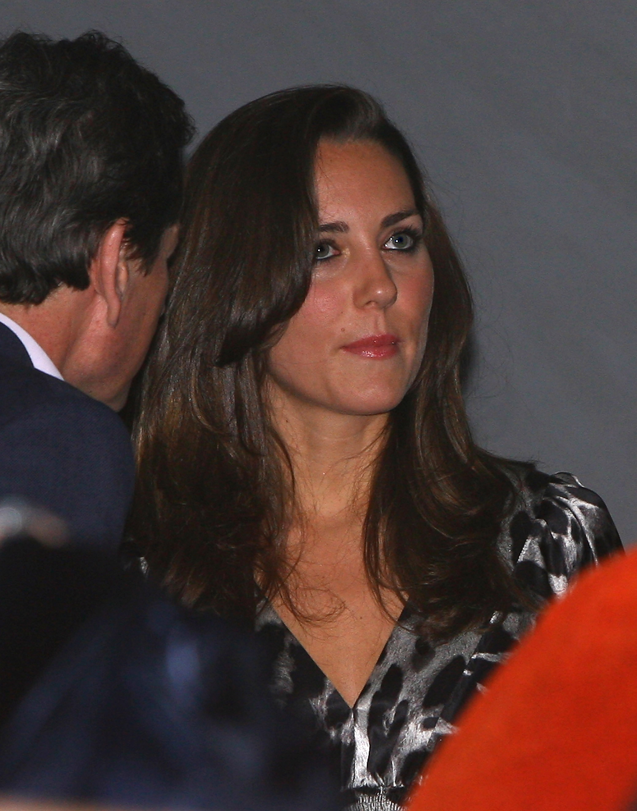 With a polished look and thoughtful expression, Kate Middleton takes in an evening of world-class entertainment, embodying the quiet confidence that would soon make her a global style icon.