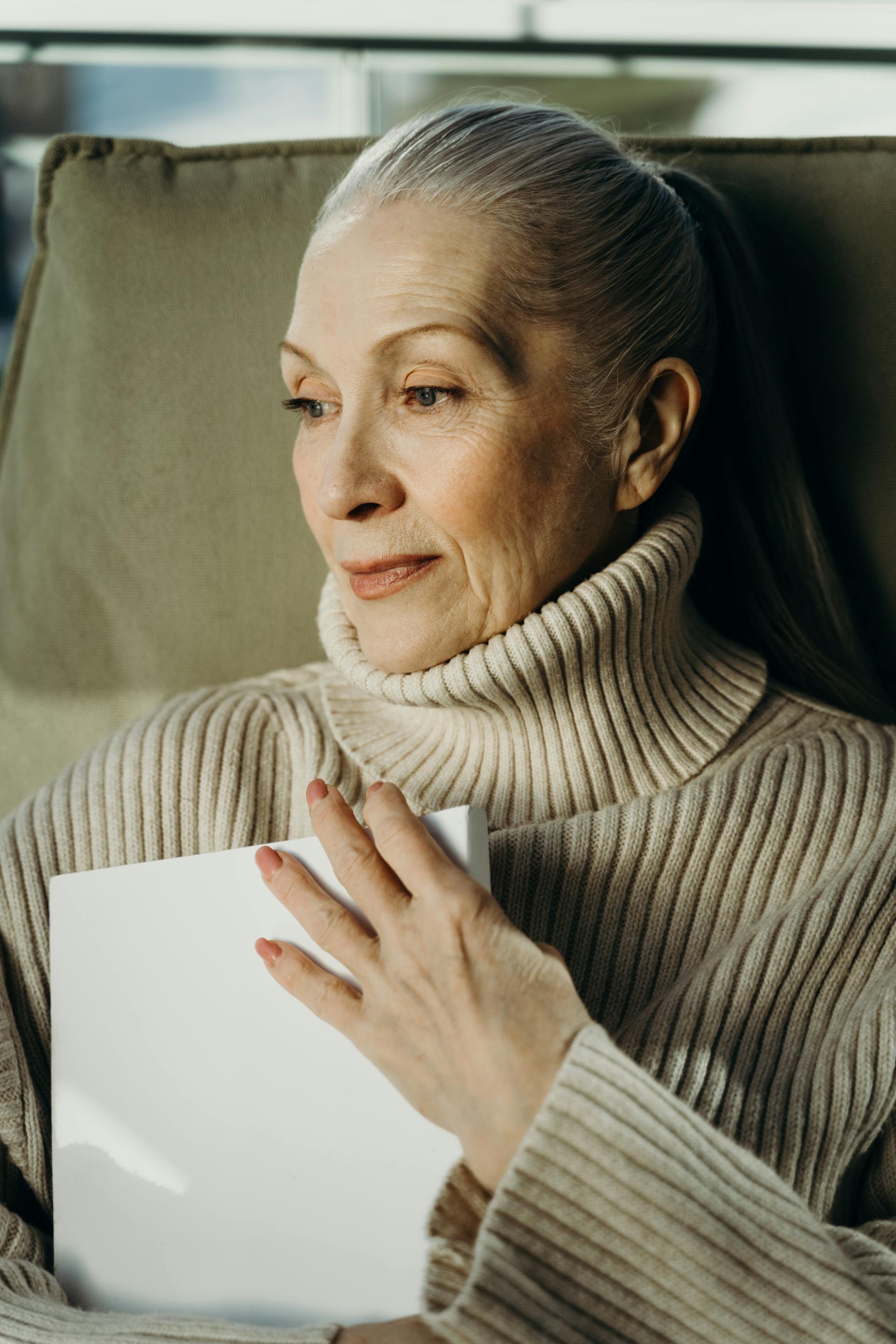 A reflective senior woman | Source: Pexels