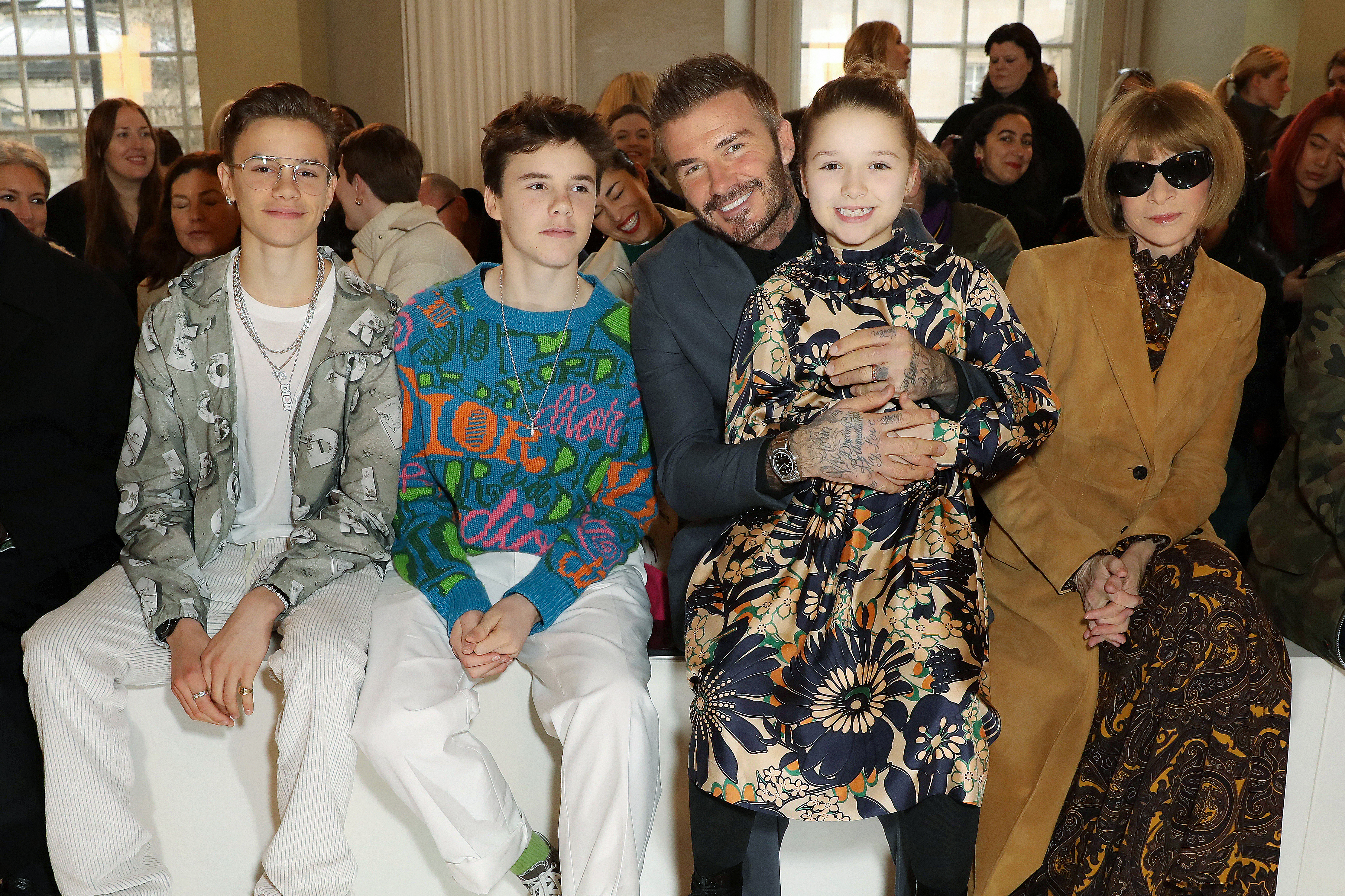 Romeo, Cruz, David, and  Harper Beckham and Anna Wintour attend the Victoria Beckham show during London Fashion Week February 2020 on February 16, 2020 in London, England | Source: Getty Images