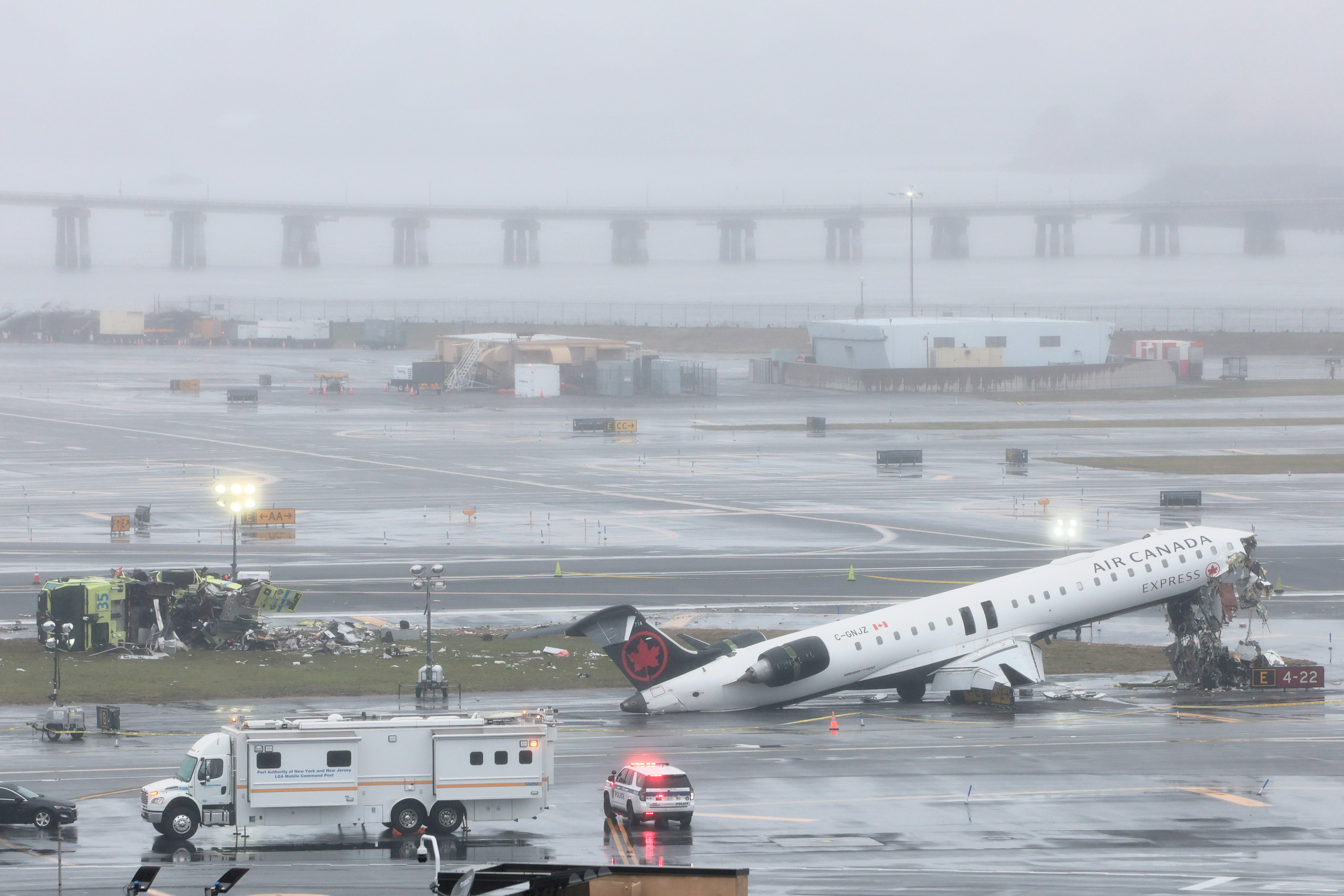 Air Canada Express CRJ-900 sits on the runway after colliding with a Port Authority fire truck at LaGuardia Airport on March 23, 2026, in New York City. | Source: Getty Images