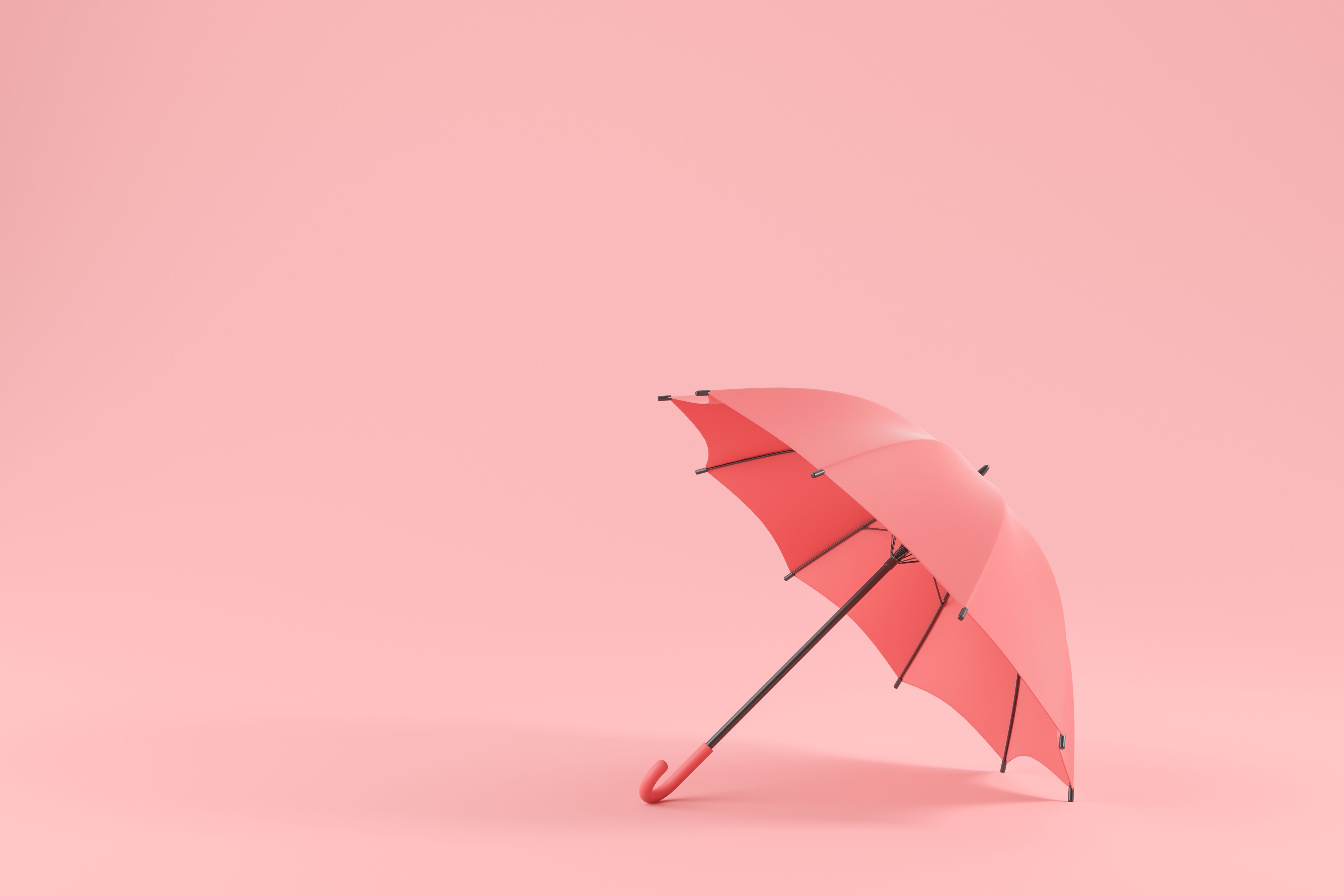 Pink umbrella | Source: Shutterstock