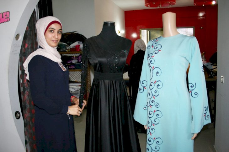 Fashion designer Nermin Demjati in her shop in the centre of Gaza, Palestine, 7 June 2016. The 29-year-old designs individual items for her clients using the brand name 'Voile Moda'. PHOTO: STEFANIE JAERKEL/dpa | usage worldwide (Photo by Stefanie Järkel/picture alliance via Getty Images)