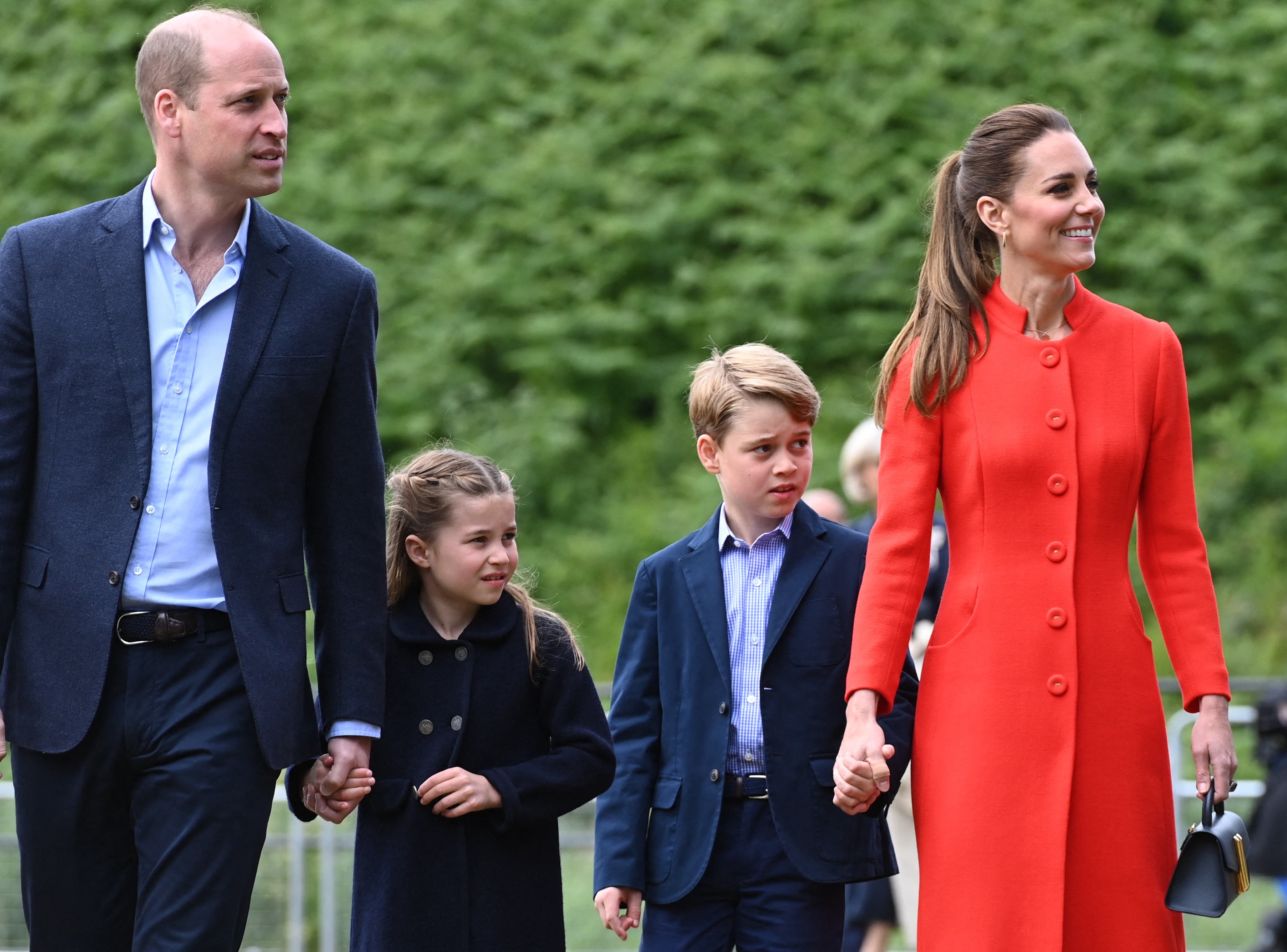 Britain's Prince William, Duke of Cambridge, Britain's Catherine, Duchess of Cambridge, and their children Britain's Prince George and Britain's Princess Charlotte visit Cardiff Castle in Wales on June 4, 2022 as part of the royal family's tour for Queen Elizabeth II's platinum jubilee celebrations. | Source: Getty Images