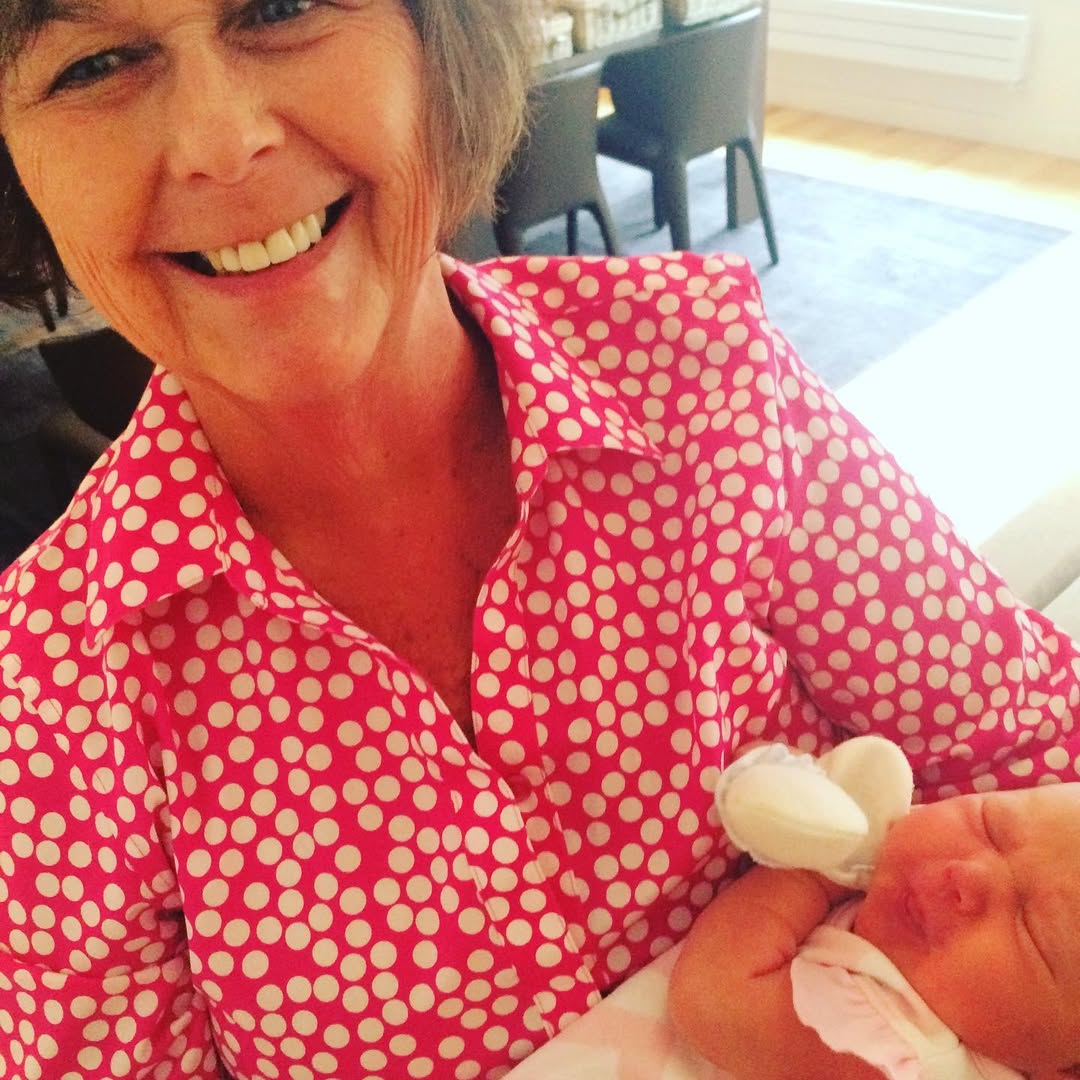 Nancy Guthrie holds her grandchild | Source: Instagram/savannahguthrie