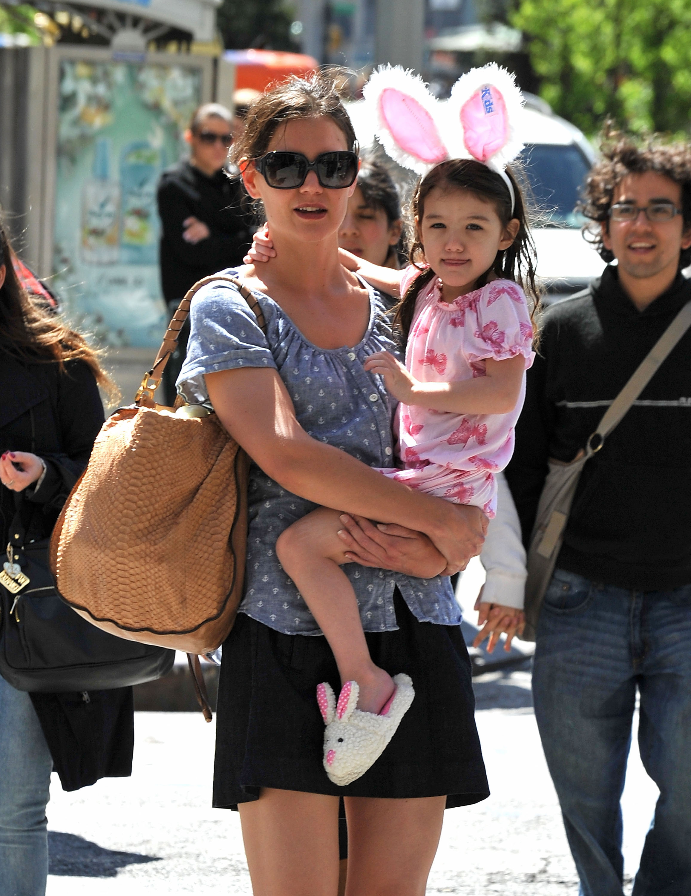 Katie Holmes and Suri Cruise seen walking around Union Square on April 10, 2010 in New York City. | Source: Getty Images