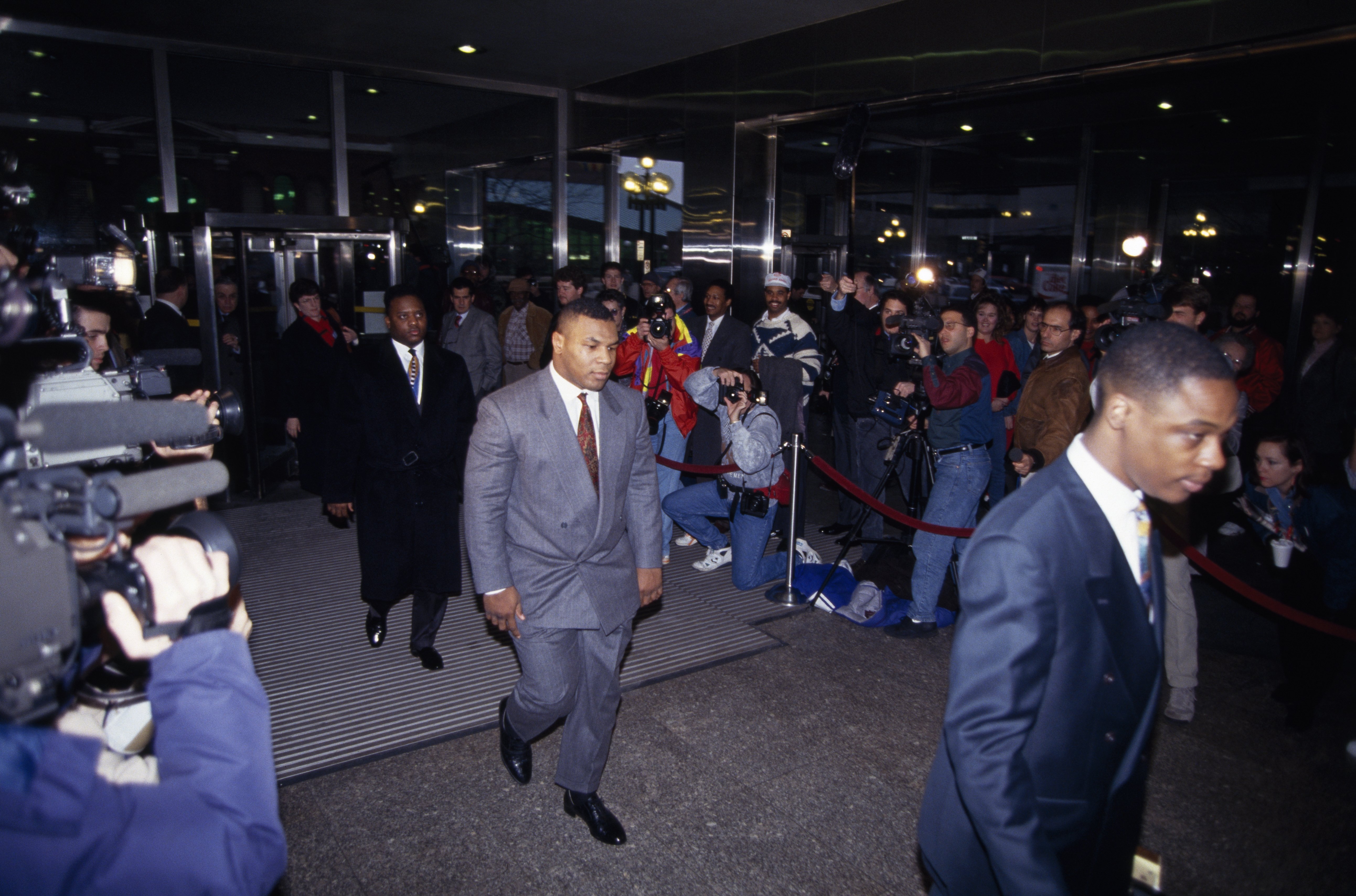 Mike Tyson arriving at the Marion County Courthouse where he was on trial for the rape of Desiree Washington | Source: Getty Images