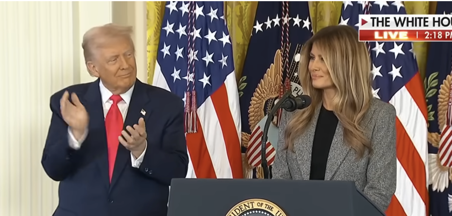 Donald Trump claps as Melania wraps up her speech during an executive order signing in the East Room of the White House in Washington, DC, on November 13, 2025 | Source: YouTube/@FoxNews