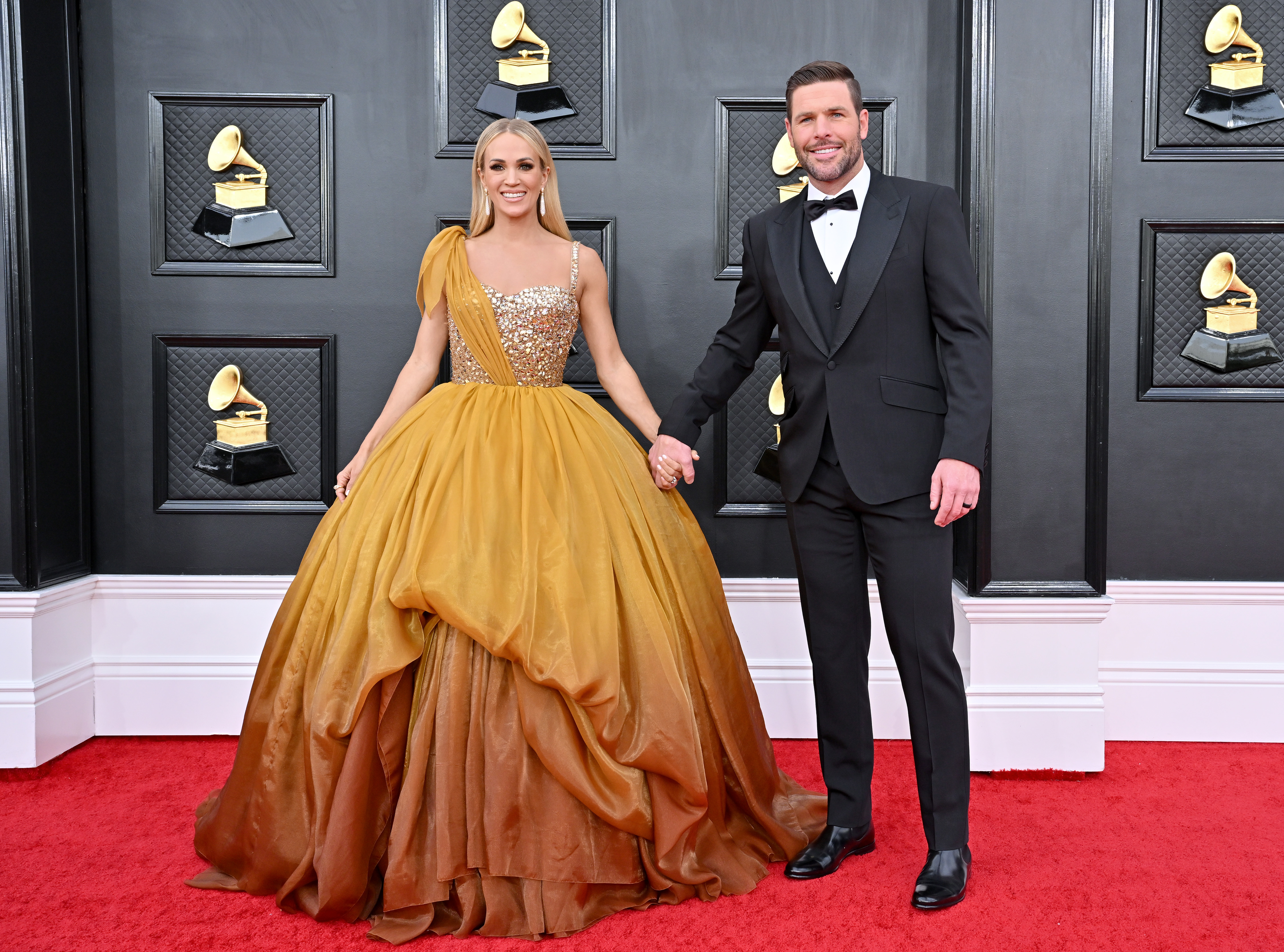 Carrie Underwood and Mike Fisher at the 64th Annual Grammy Awards in Las Vegas, Nevada on April 03, 2022 | Source: Getty Images