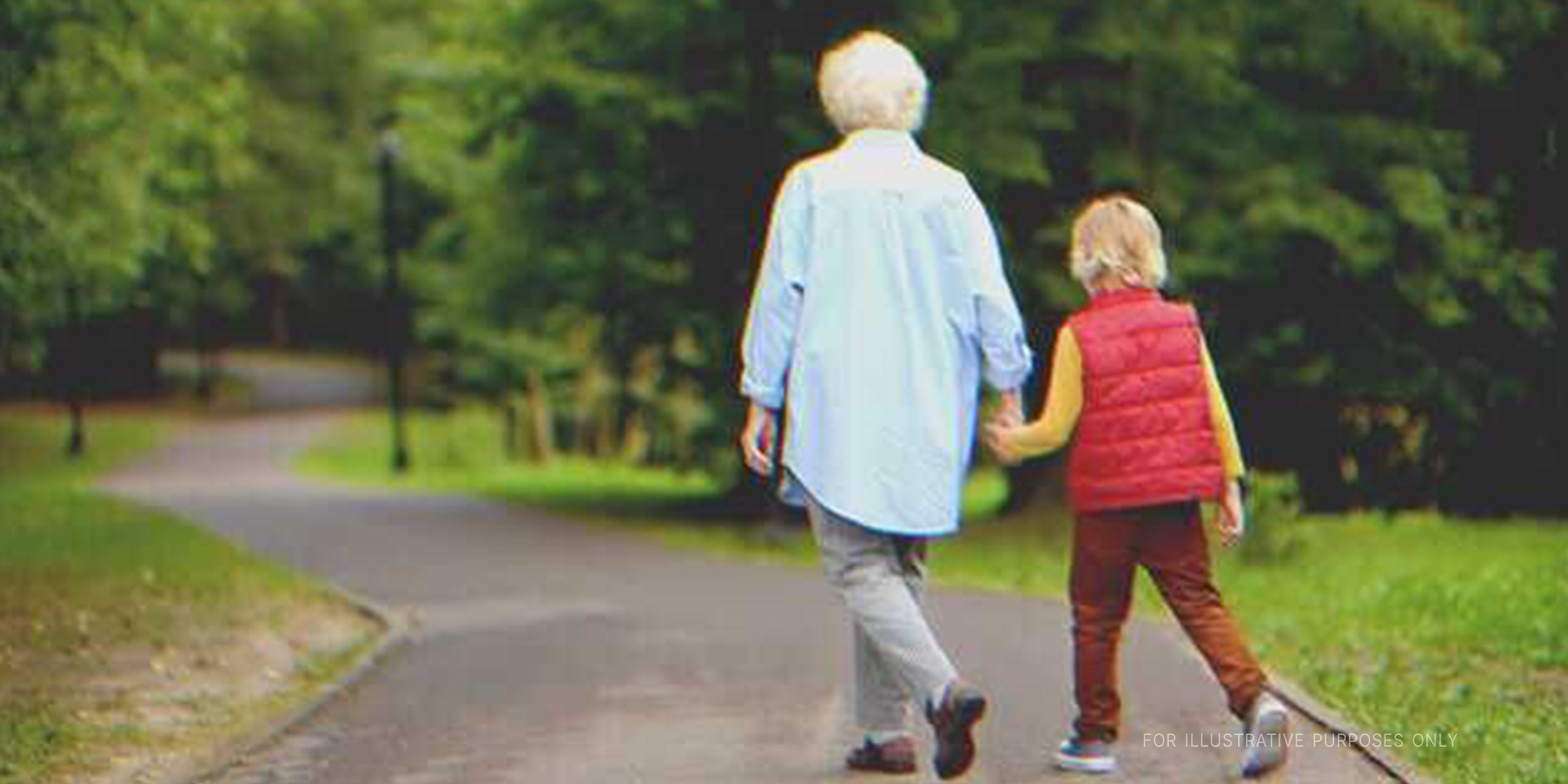 Grandmother Holding Her Grandson's Hand While Walking. | Source: Shutterstock