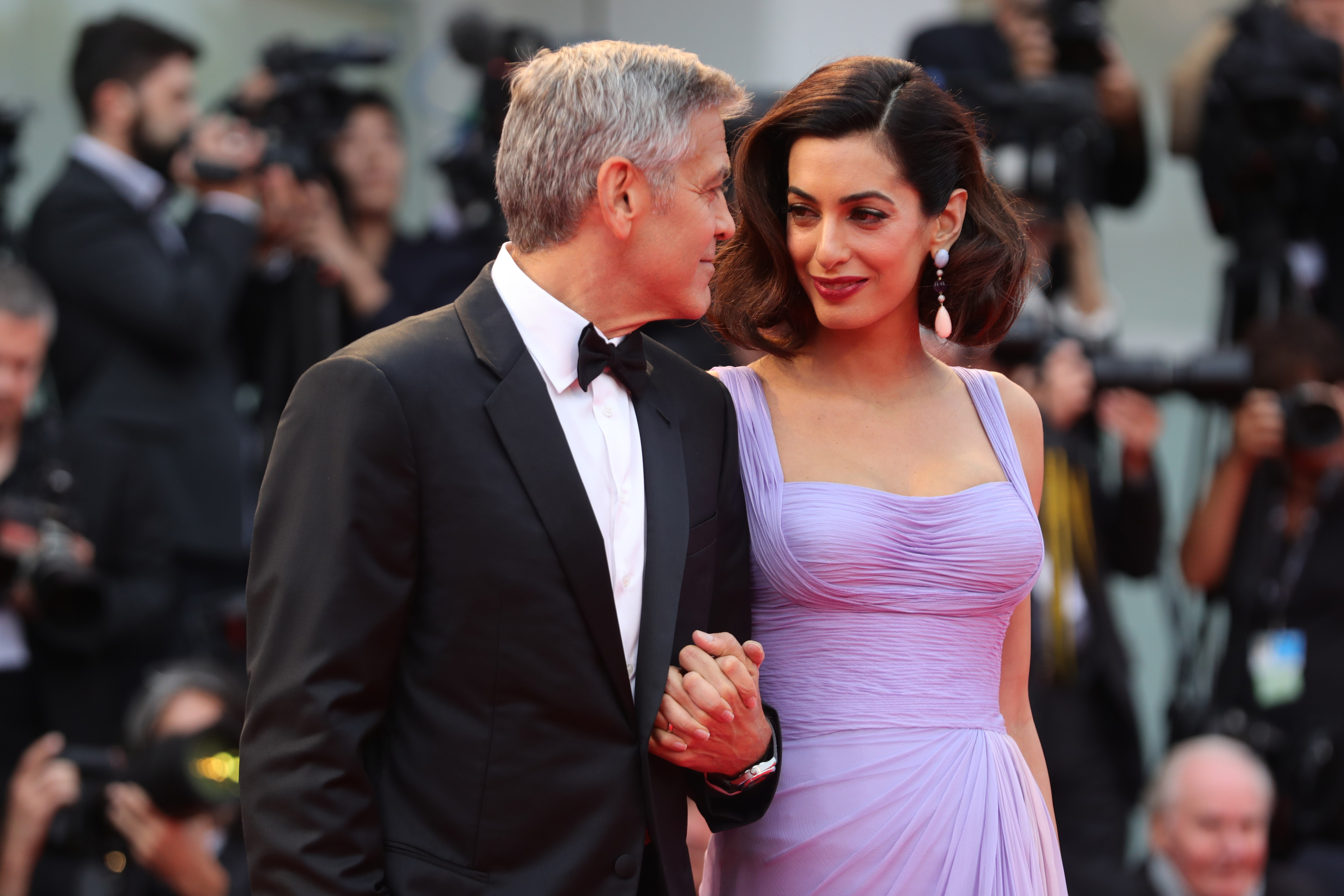 George and Amal Clooney at the 74th Venice Film Festival in Venice, Italy on September 2, 2017 | Source: Getty Images
