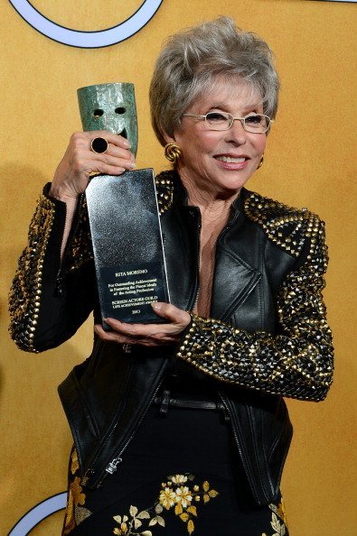 Rita Moreno, recipient of the Screen Actors Guild Life Achievement Award, poses in the press room during the 20th Annual Screen Actors Guild Awards at The Shrine Auditorium on January 18, 2014, in Los Angeles, California. | Source: Getty Images.