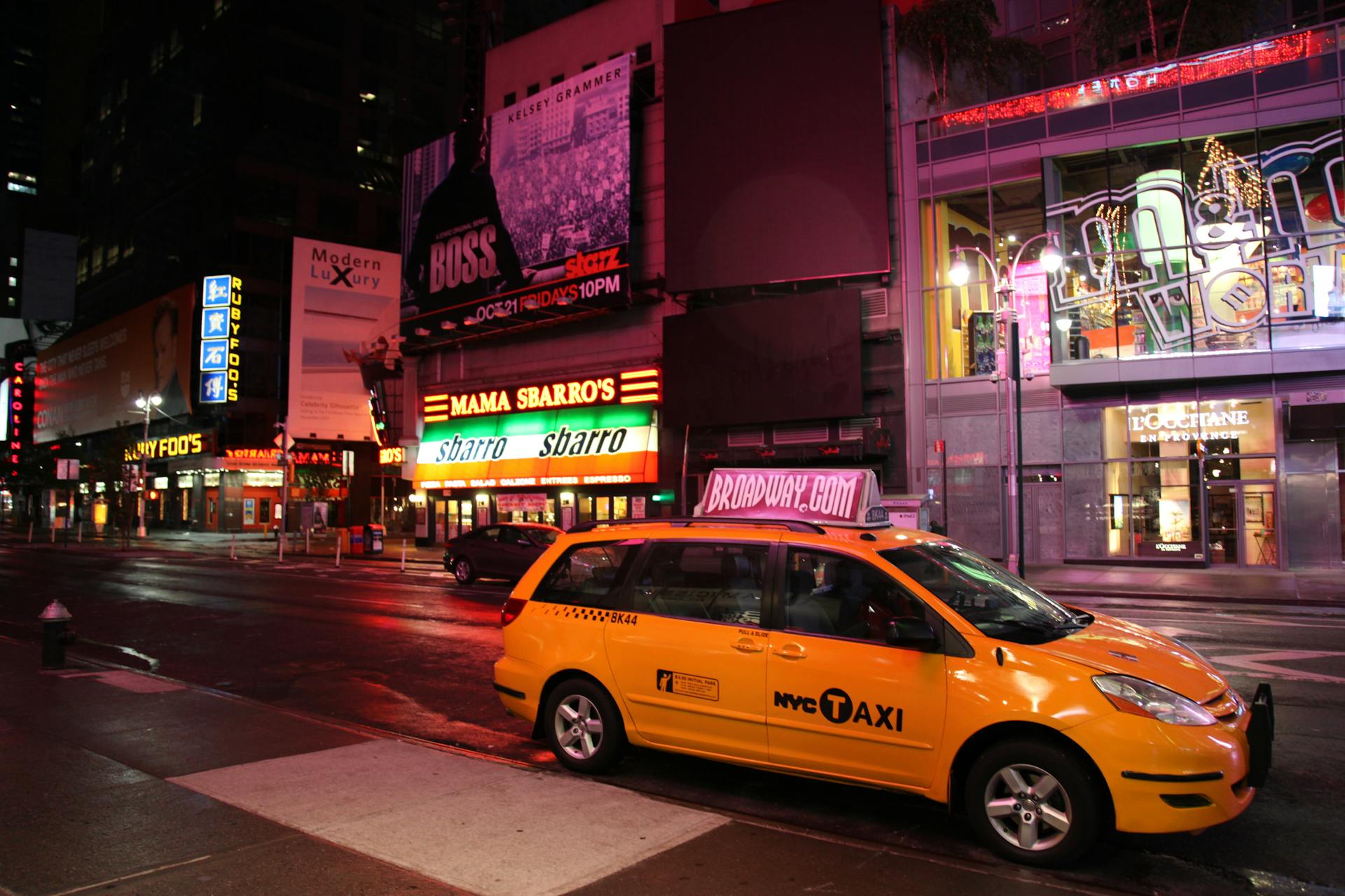 A yellow cab on a road during the night | Source: Pexels