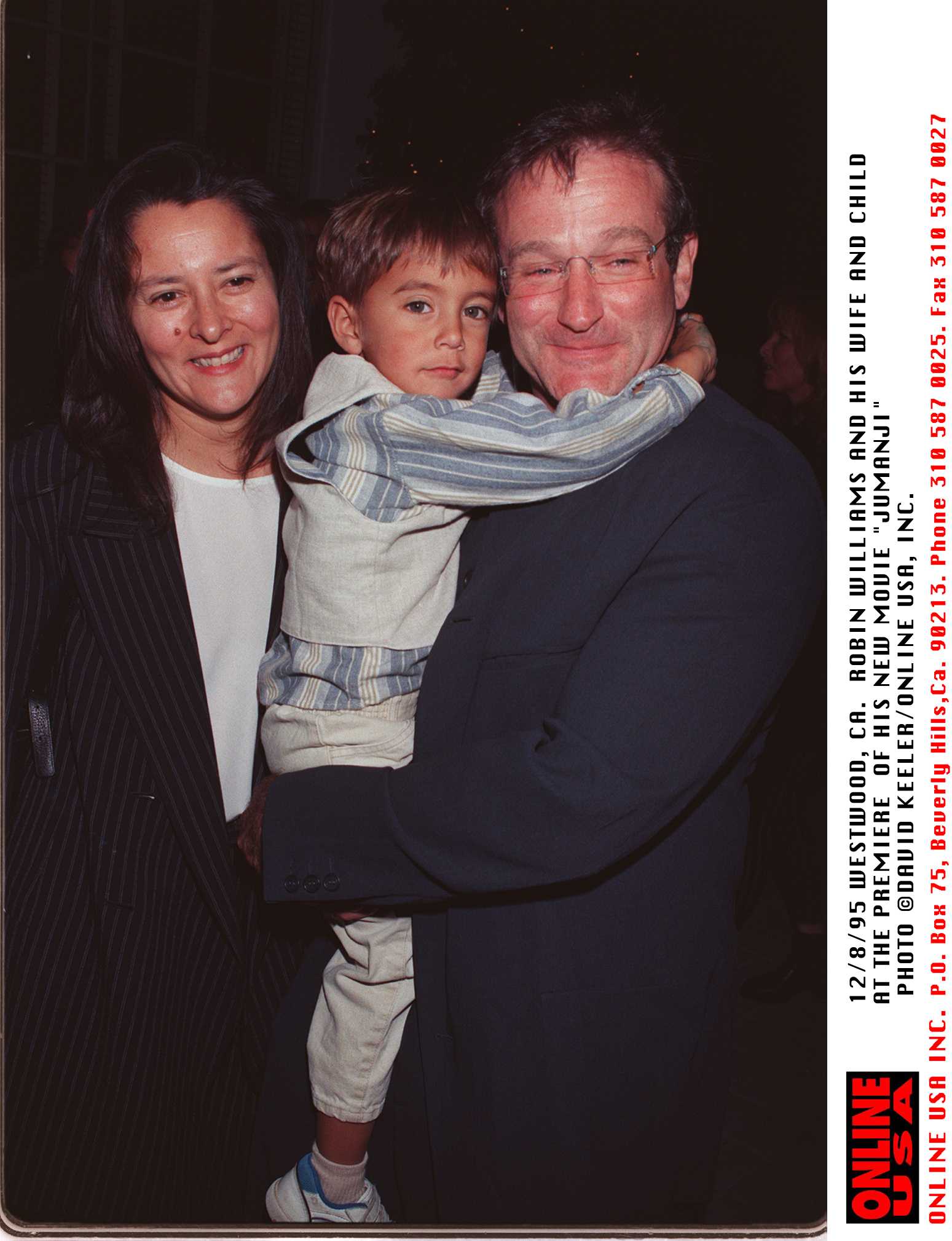 Robin Williams with his wife, Marsha Garces, and their son, Cody at the premiere of his new movie, "Jumanji" on December 8, 1995, in Westwood, California. | Source: Getty Images