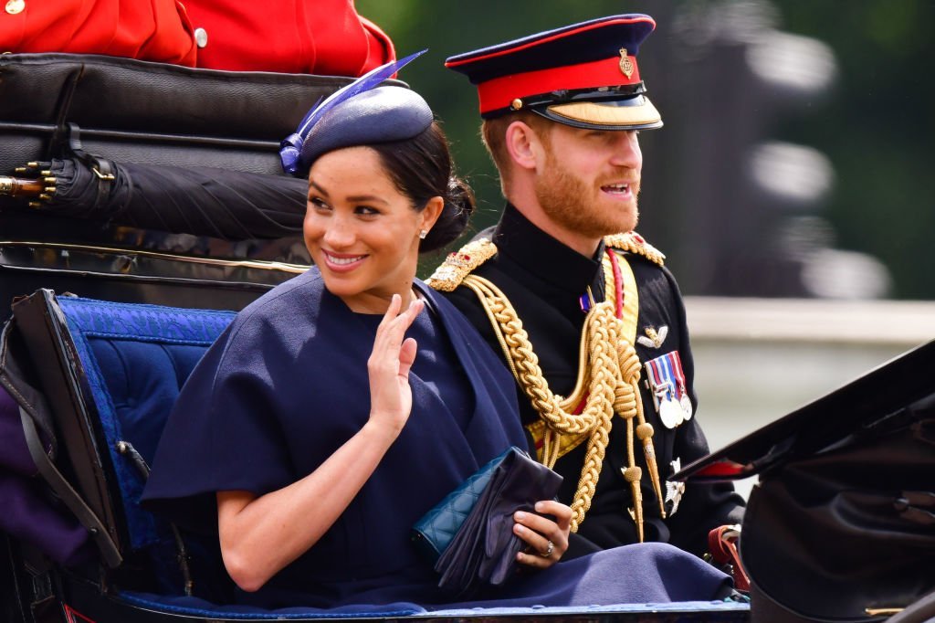 Prince Harry and Meghan Markle in a carriage during Trooping The Colour on June 8 | Photo: Getty Images