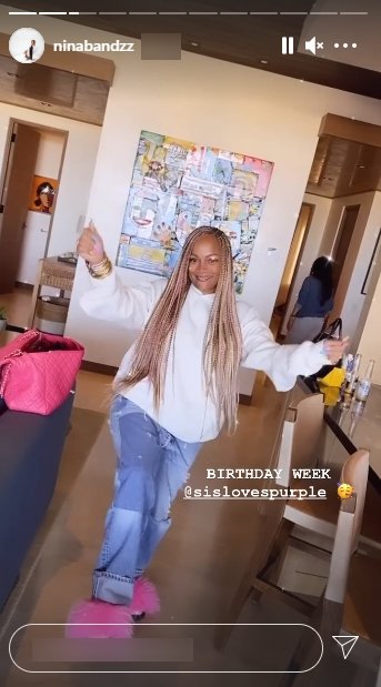 LL Cool J's wife, Simone Smith, posing for a picture during their family getaway for her daughter, Nina Symone's, birthday | Photo:Instagram/ninabandzz