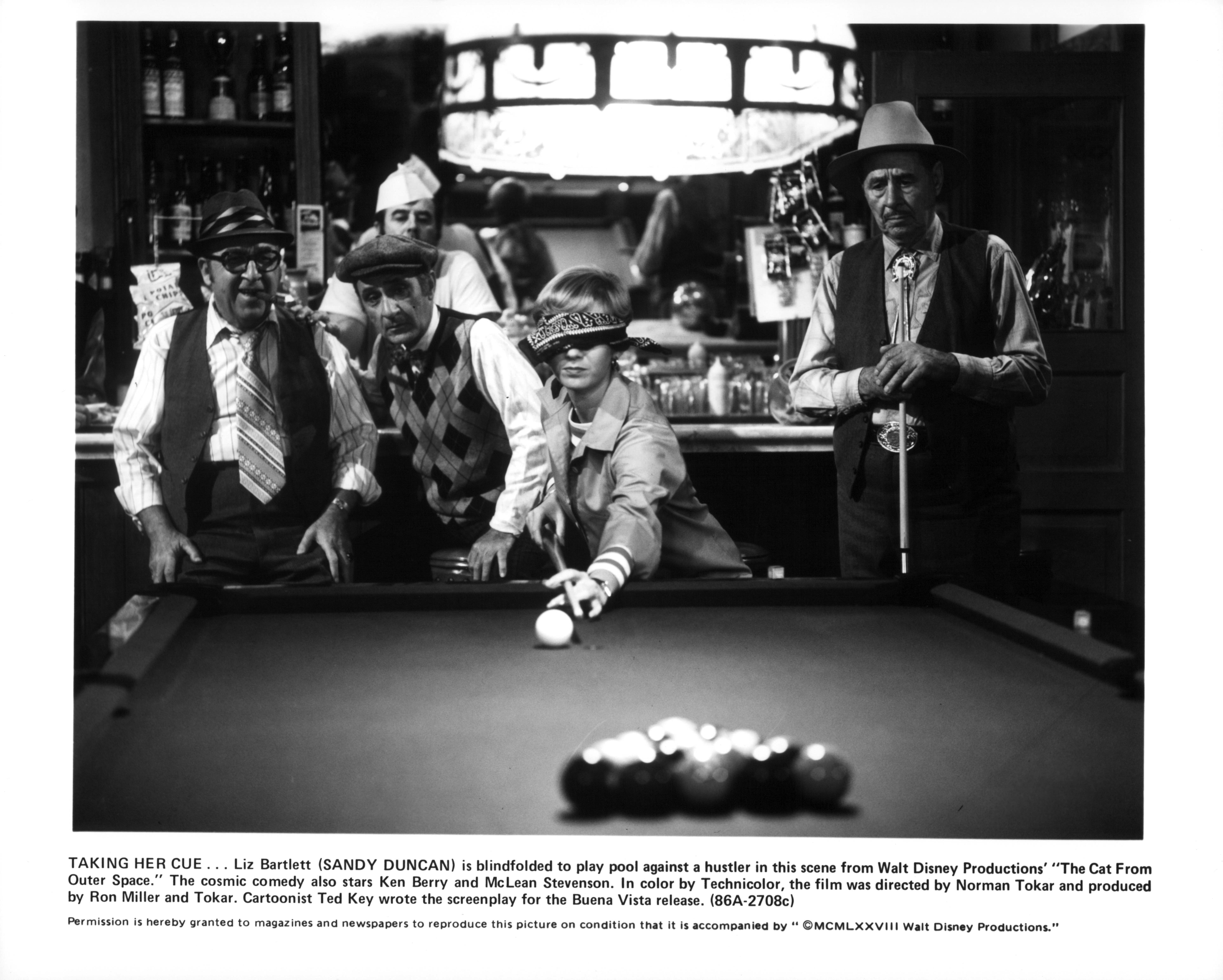 Sandy Duncan plays pool blindfolded in "The Cat From Outer Space" in 1978 | Source: Getty Images