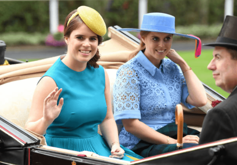 Princess Eugenie Princess Beatrice sit in a carriage at the Royal Ascot, on June 18, 2019, in Ascot, England | Source: Getty Images