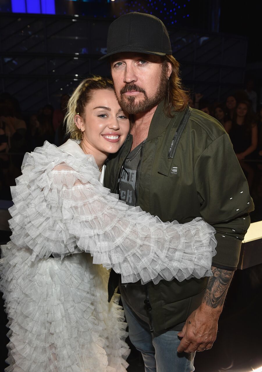 Miley Cyrus and Billy Ray Cyrus attend the 2017 Billboard Music Awards at T-Mobile Arena. | Source: Getty Images