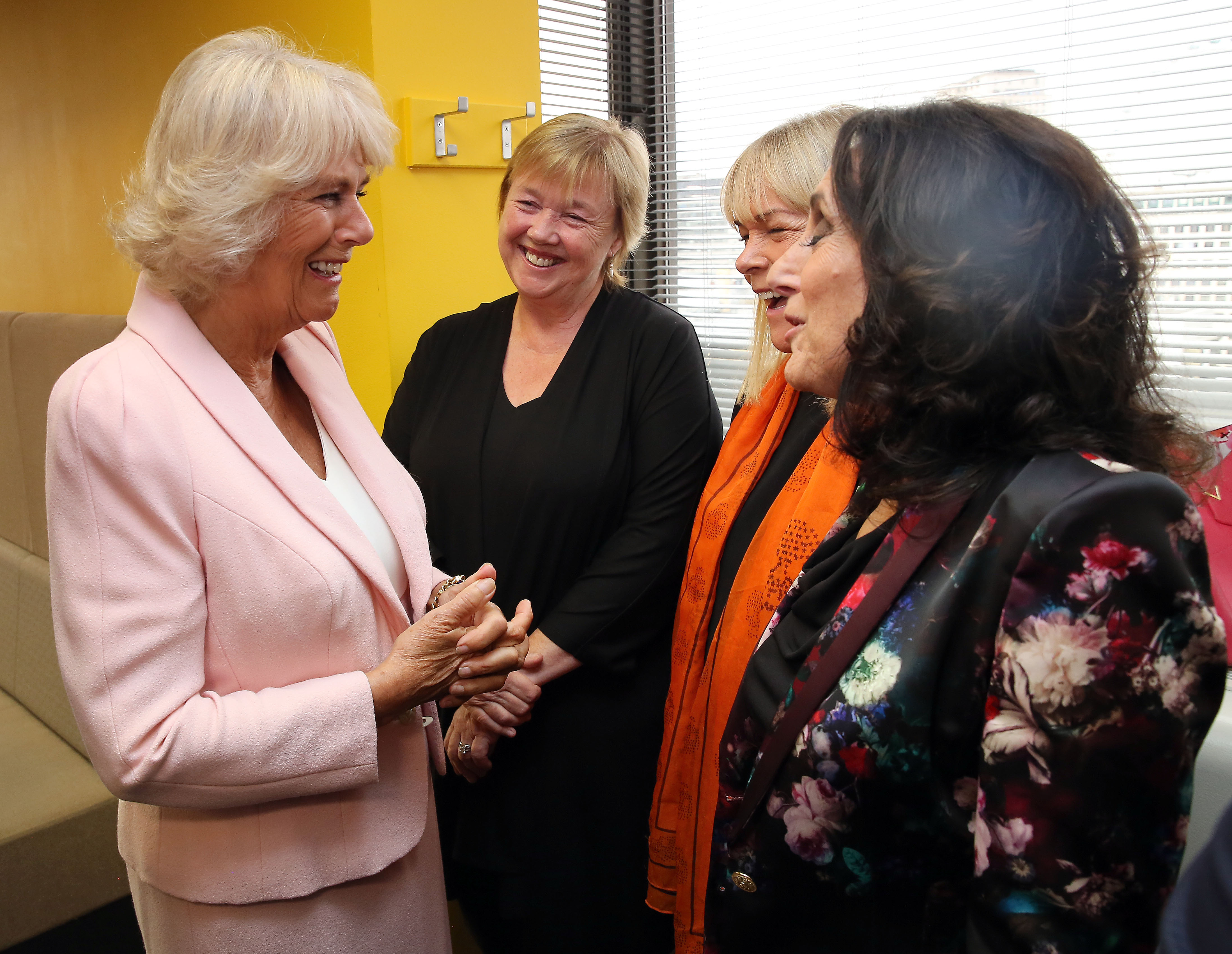 Queen Camilla with Pauline Quirke, Linda Robson, and Lesley Joseph at ITV Studios to mark their 60th anniversary on September 9, 2915, in London, England. | Source: Getty Images