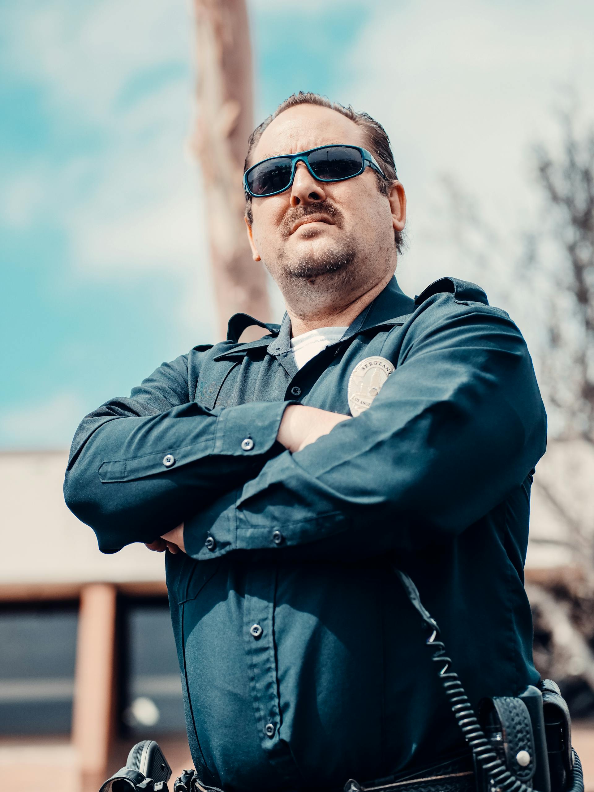 A cop crossing his arms | Source: Pexels